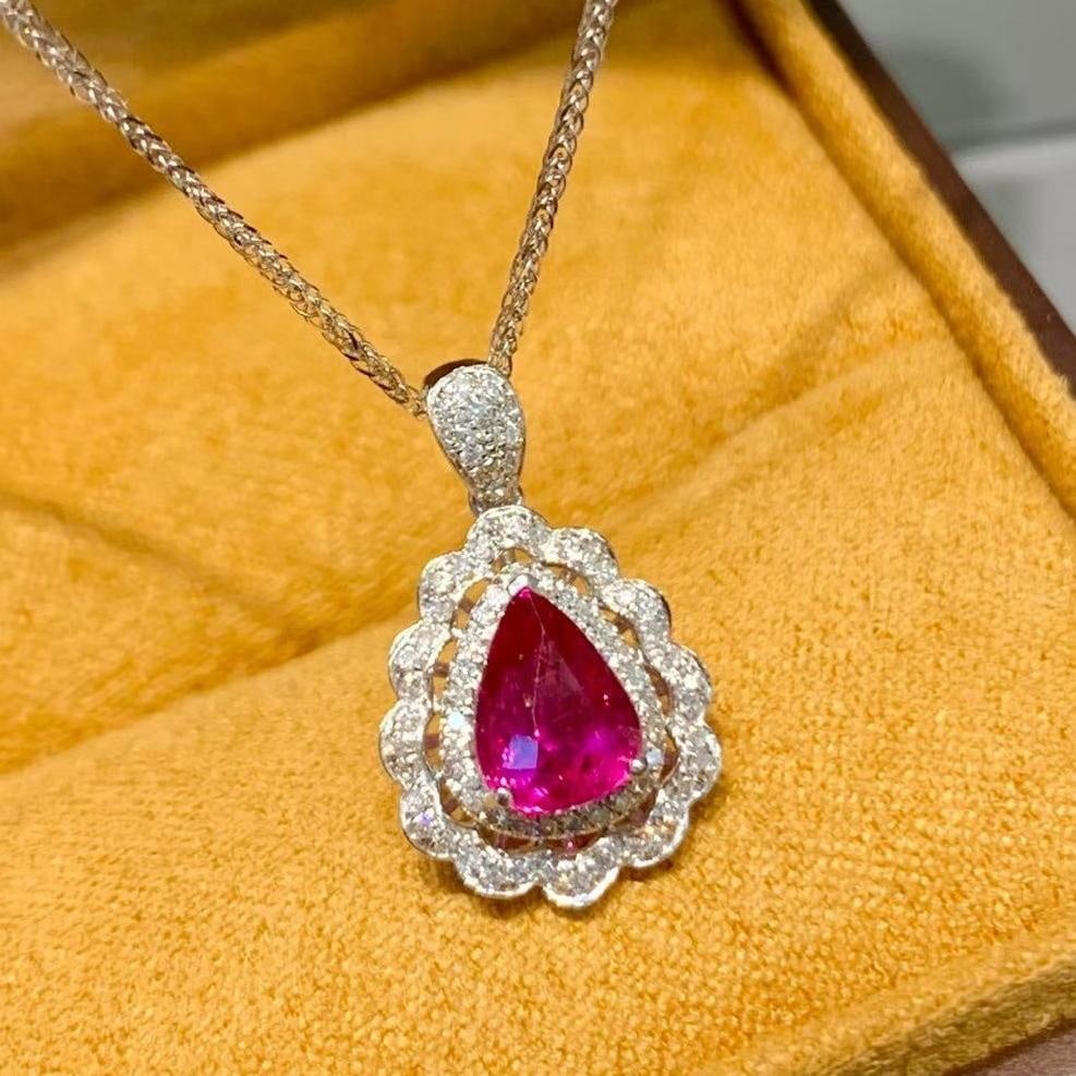 14k Gold 1.15 Ct Natural Ruby & Diamond Pendant( Without Chain ): Ref:231035148 // gold content:14k gold // main gemstone:ruby // shape:pear // carat weight:1. 15ct // color:red // treatment:natural // // adjacent gemstone 2 : diamond // shape:round // clarity grade