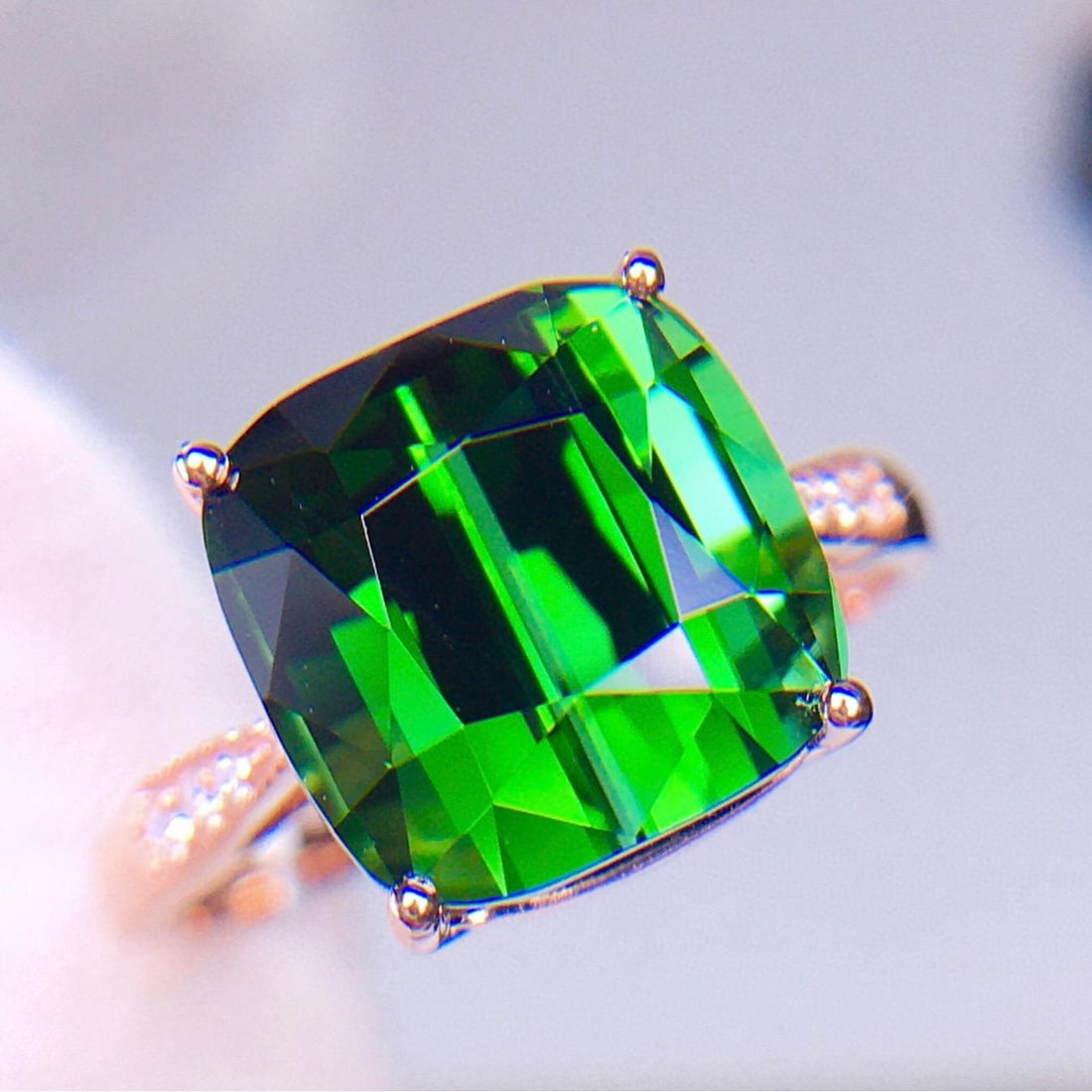 14k Gold 6.2 Ct Natural Tourmaline & Diamond Ring: Ref:231035165 // gold content:14k gold // ring size:7. 25us // // main gemstone:tourmaline // shape:cushion // carat weight:6. 2ct // color:green // treatment:natural // // adjacent gemstone 2 :