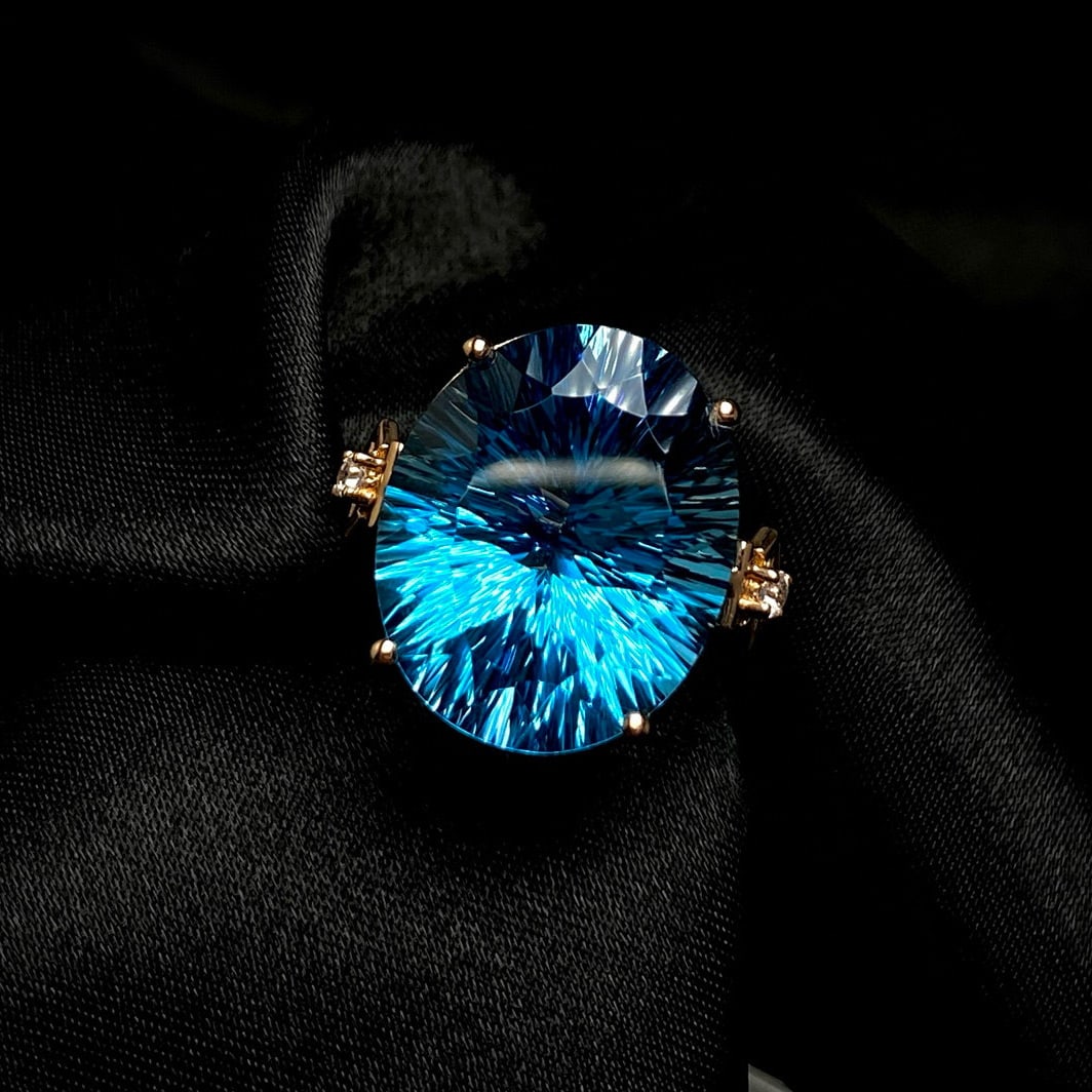 14k Gold 18.55 Ct Natural Topaz & Diamond Ring: Ref:231035175 // gold content:14k gold // ring size:7. 25us // // main gemstone:topaz // shape:oval // carat weight:18. 55ct // color:blue // treatment:natural // // adjacent gemstone 2 : diamond // n