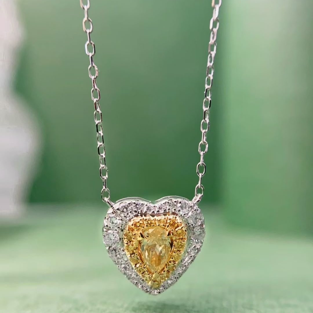 14k Gold 0.25 Ct Natural Yellow Diamond & Diamond Necklace: Ref:231035186 // gold content:14k gold // main gemstone:yellow diamond // shape:pear // carat weight:0. 25ct // color:yellow // treatment:natural // // adjacent gemstone 2 : diamond // shape:round //
