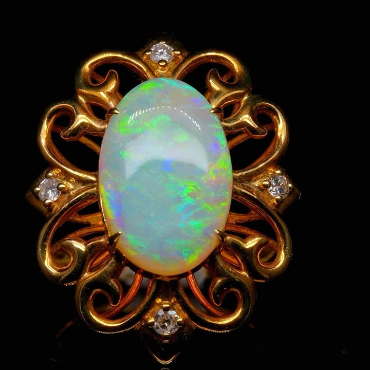 14k Gold 2.97 Ctw Natural Opal & Diamond Ring: Ref:231035237 // gold content:14k gold // ring size:7. 25us // // main gemstone:opal // shape:oval // carat weight:2. 85ct // color:color // treatment:natural // // adjacent gemstone 2 : diamond // sh