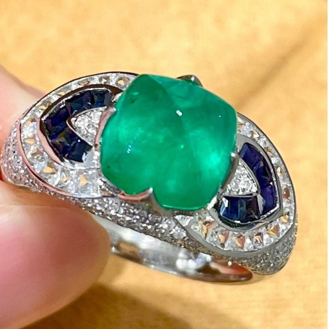 14k Gold 3.4 Ctw Natural Emerald & Diamond Ring: Ref:231035248 // gold content:14k gold // ring size:7. 25us // // main gemstone:emerald // shape:suger-loaf // carat weight:2. 8ct // color:green // treatment:natural // // adjacent gemstone 2 :