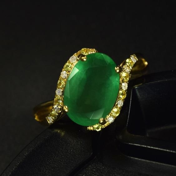 14k Gold 2.59 Ctw Natural Emerald & Diamond Ring: Ref:231036007 // gold content:14k gold // ring size:7. 25us // // main gemstone:emerald // shape:oval // carat weight:2. 51ct // color:green // treatment:natural // // adjacent gemstone 2 : diamond