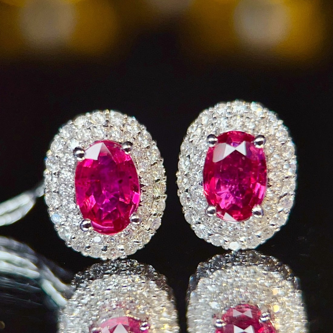 14k Gold 1 Ct Natural Ruby & Diamond Earrings: Ref:231036013 // gold content:14k gold // main gemstone:ruby // shape:oval // carat weight:1ct // color:red // treatment:natural // // adjacent gemstone 2 : diamond // number of stones:88 // shape:rou