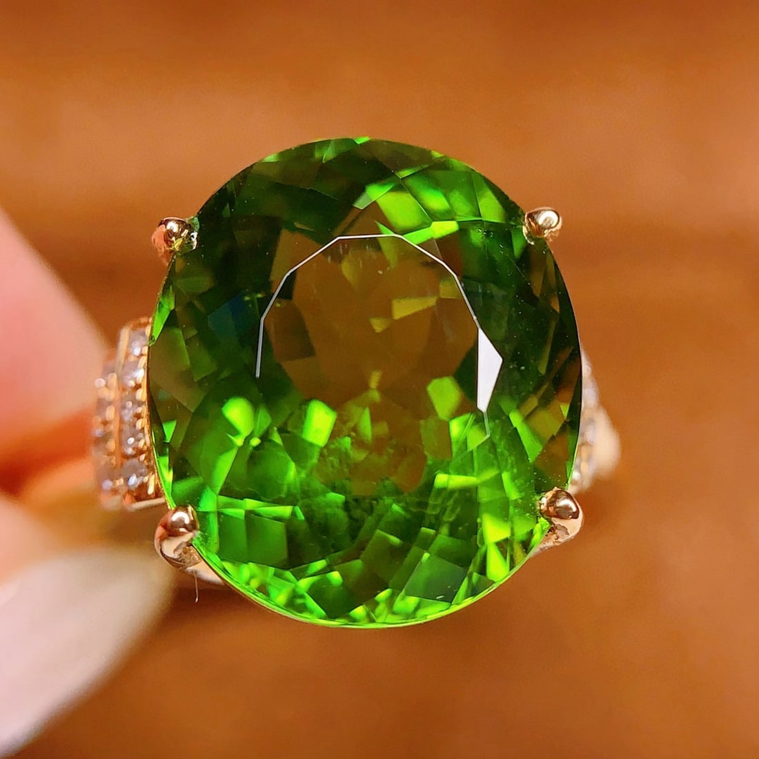 14k Gold 7.2 Ct Natural Tourmaline & Diamond Ring: Ref:231036034 // gold content:14k gold // ring size:7. 25us // // main gemstone:tourmaline // shape:oval // carat weight:7. 2ct // color:green // treatment:natural // // adjacent gemstone 2 : diamond
