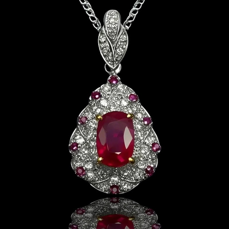 14k Gold 1.17 Ctw Natural Ruby & Diamond Pendant( Without Chain ): Ref:231036044 // gold content:14k gold // main gemstone:ruby // shape:oval // carat weight:1. 01ct // color:pigeonblood red // treatment:natural // // adjacent gemstone 2 : diamond // number of
