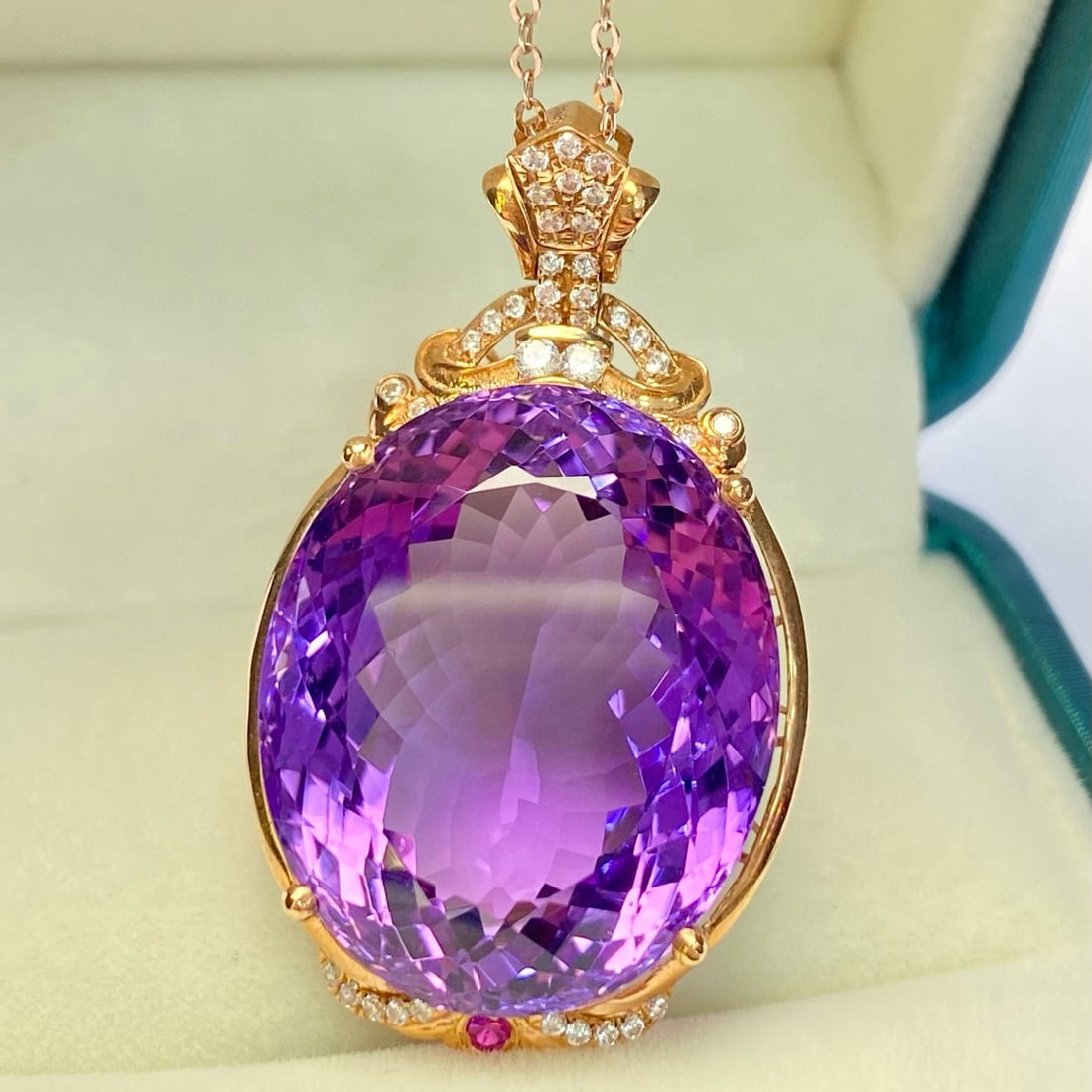 14k Gold 39.2 Ct Natural Amethyst & Zircon Pendant( Without Chain ): Ref:231036062 // gold content:14k gold // main gemstone:amethyst // shape:oval // carat weight:39. 2ct // color:purple // treatment:natural // // adjacent gemstone 2 : zircon // number of stones:37