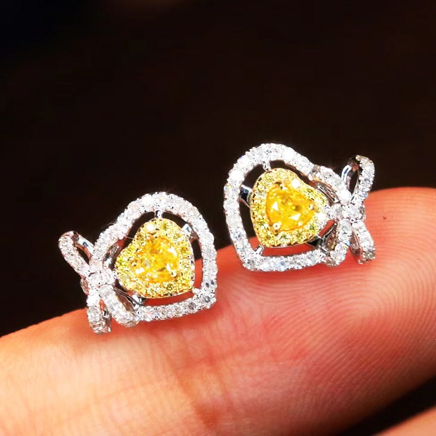 14k Gold 0.52 Ct Natural Color Diamond Earrings: Ref:231036070 // gold content:14k gold // main gemstone:diamond // shape:multiply // carat weight:0. 52ct // clarity grade:vs-si // color:color // treatment:natural // Low Estimate: 2600 Condition: