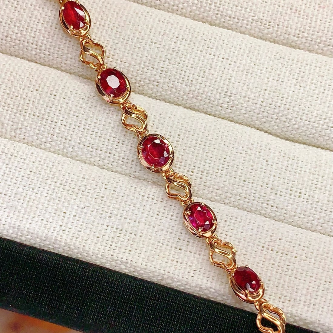 14k Gold 3.5 Ct Natural Tourmaline Bracelet: Ref:231036088 // gold content:14k gold // main gemstone:tourmaline // shape:oval // carat weight:3. 5ct // color:red // treatment:natural // Low Estimate: 3700 Condition: New High Estimate: 5600