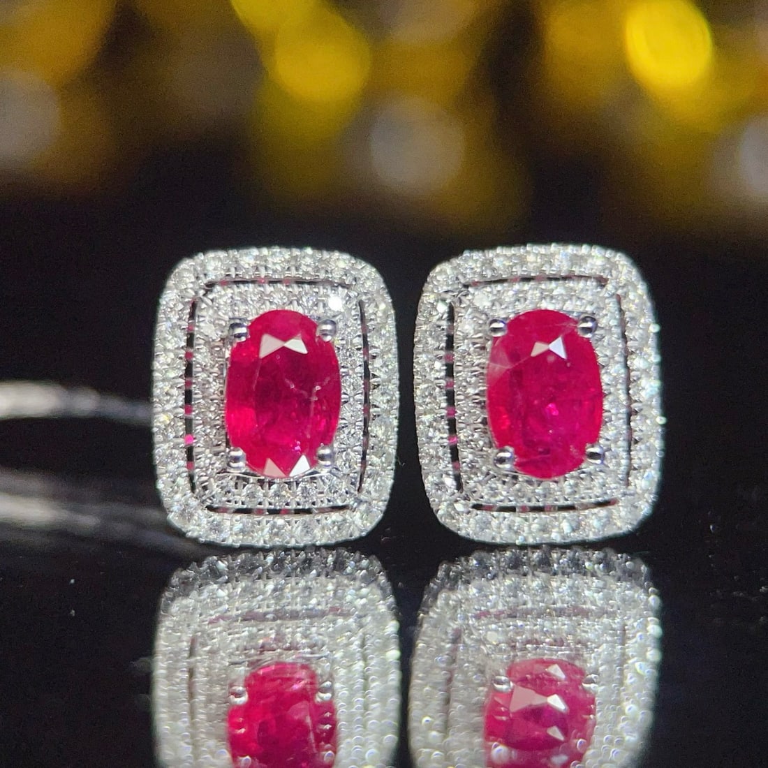 14k Gold 1.25 Ct Natural Ruby & Diamond Earrings: Ref:231036106 // gold content:14k gold // main gemstone:ruby // shape:oval // carat weight:1. 25ct // color:red // treatment:natural // // adjacent gemstone 2 : diamond // number of stones:100 //