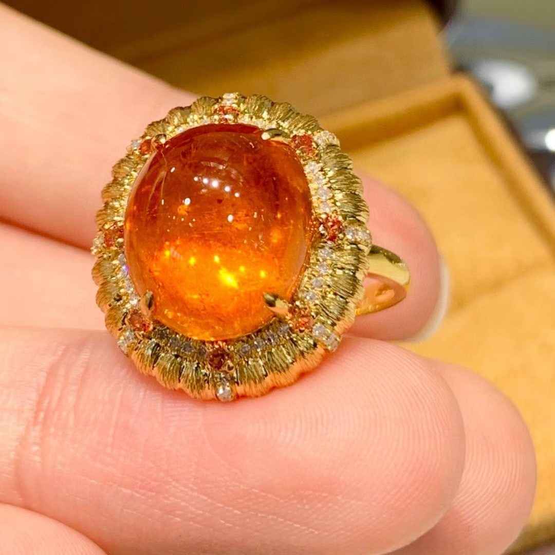 14k Gold 10.3 Ct Natural Spessartine & Diamond Ring: Ref:231036116 // gold content:14k gold // ring size:7. 25us // // main gemstone:spessartine // shape:oval // carat weight:10. 3ct // color:orange // treatment:natural // // adjacent gemstone 2 :