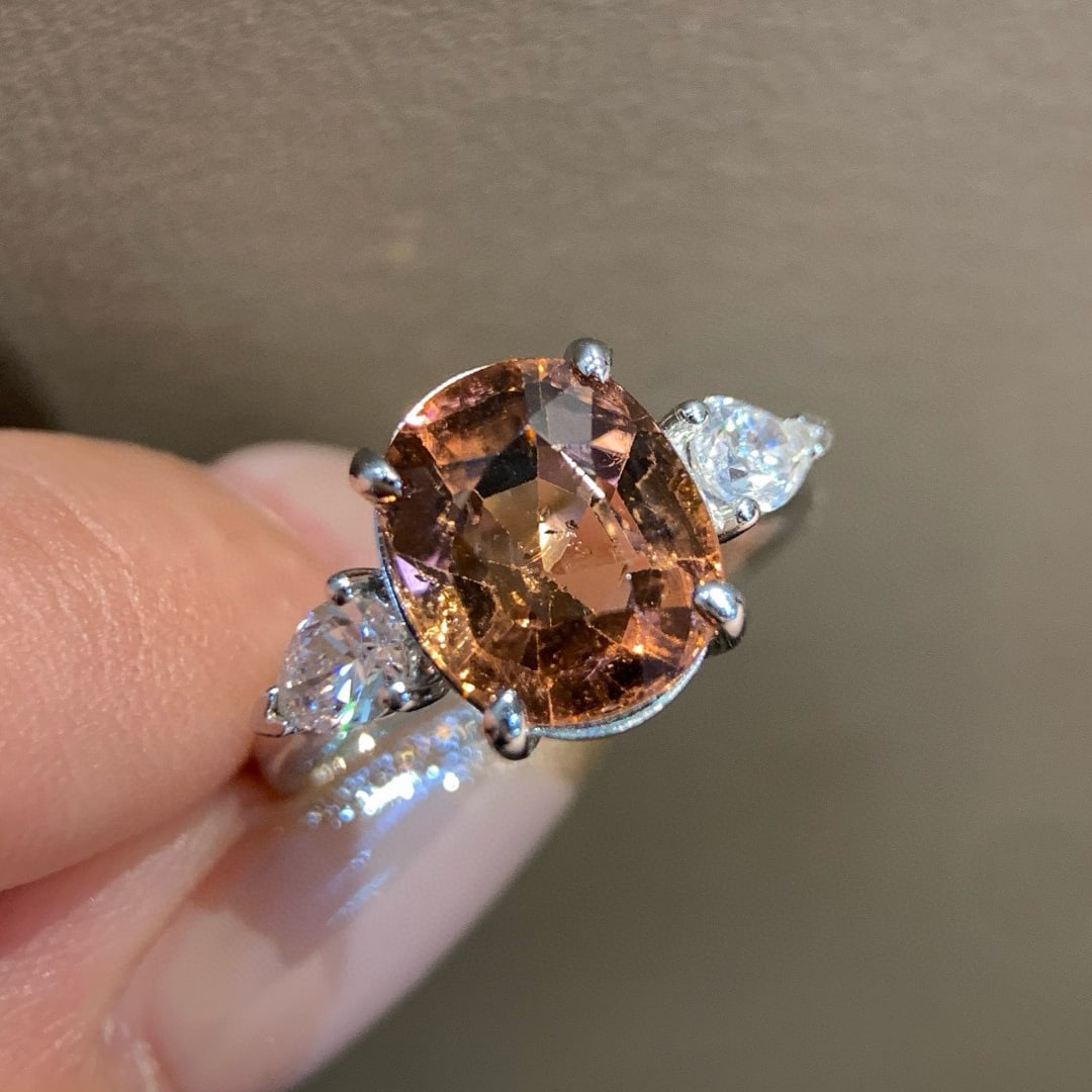 14k Gold 3.73 Ctw Natural Tourmaline & Diamond Ring: Ref:231036117 // gold content:14k gold // ring size:7. 25us // // main gemstone:tourmaline // shape:oval // carat weight:3. 25ct // color:red // treatment:natural // // adjacent gemstone 2 : diamond
