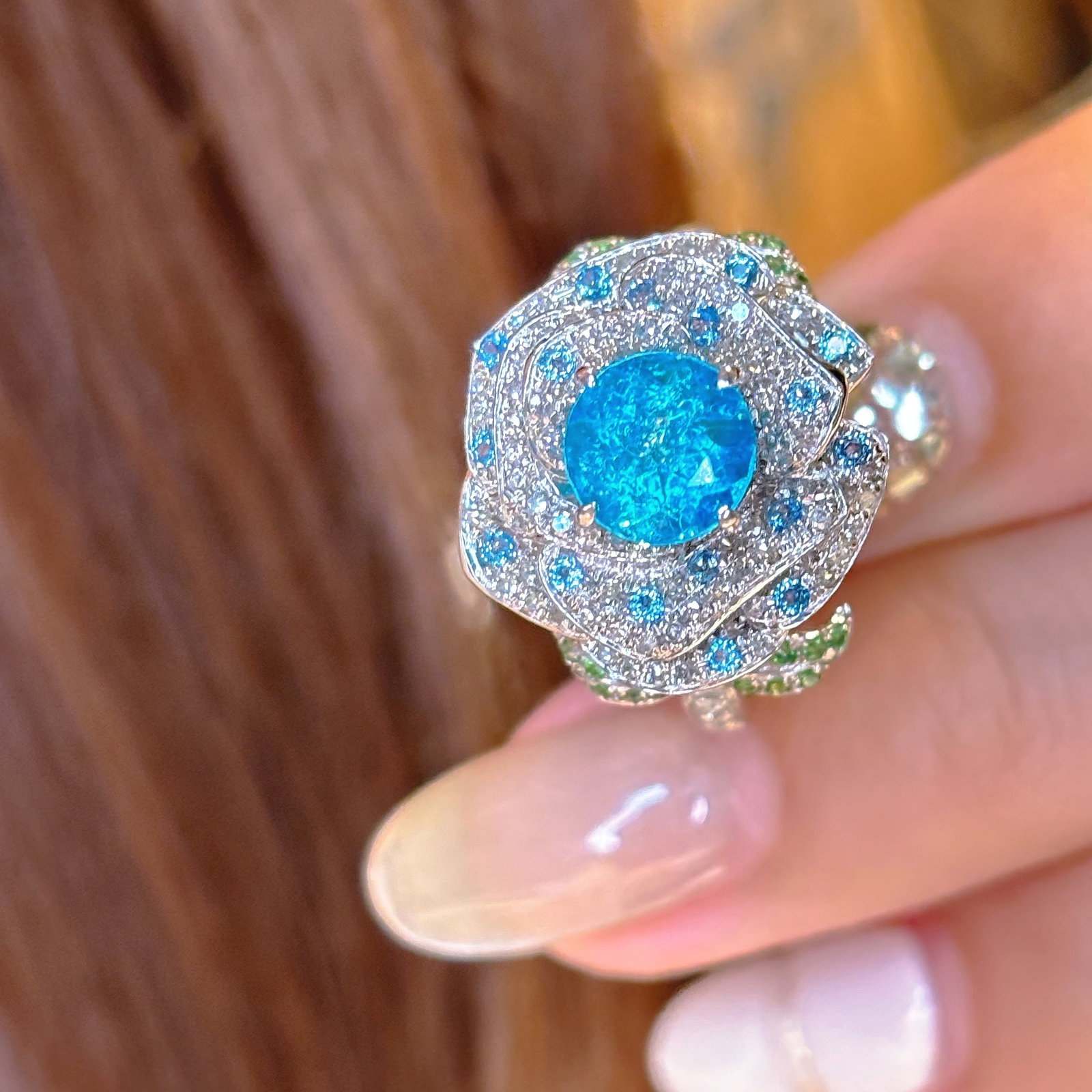 14k Gold 1.15 Ct Natural Paraiba Tourmaline & Diamond Ring: Ref:231036123 // gold content:14k gold // ring size:7. 25us // // main gemstone:paraiba tourmaline // shape:round // carat weight:1. 15ct // color:blue // treatment:natural // cut grade:g // // adjace
