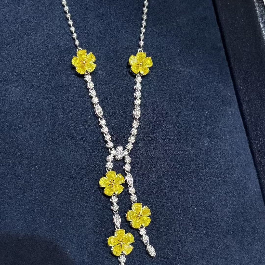 14k Gold 5.02 Ct Natural Yellow Diamond & Diamond Necklace: Ref:231036129 // gold content:14k gold // main gemstone:yellow diamond // shape:pear // carat weight:5. 02ct // color:yellow // treatment:natural // // adjacent gemstone 2 : diamond // shape:round //