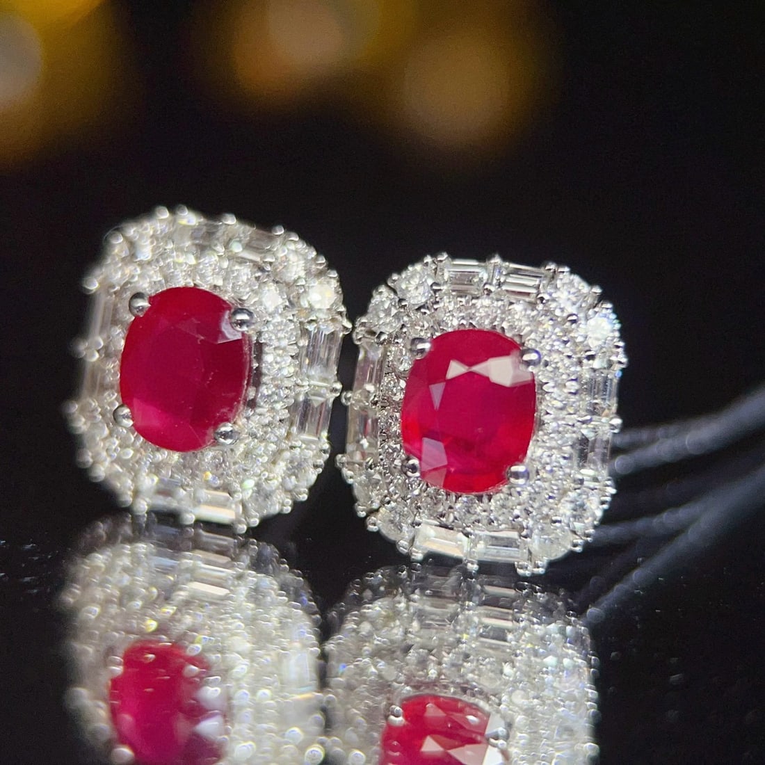 14k Gold 1.45 Ct Natural Ruby & Diamond Earrings: Ref:231036148 // gold content:14k gold // main gemstone:ruby // shape:oval // carat weight:1. 45ct // color:red // treatment:natural // // adjacent gemstone 2 : diamond // number of stones:68 //