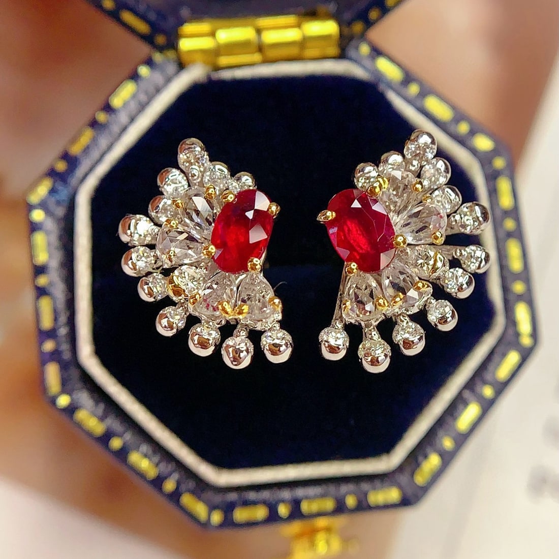 14k Gold 0.8 Ct Natural Ruby & Diamond & Sapphire Earrings: Ref:231036197 // gold content:14k gold // main gemstone:ruby // shape:oval // carat weight:0. 8ct // color:red // treatment:natural // // adjacent gemstone 2 : diamond // number of stones:26 //