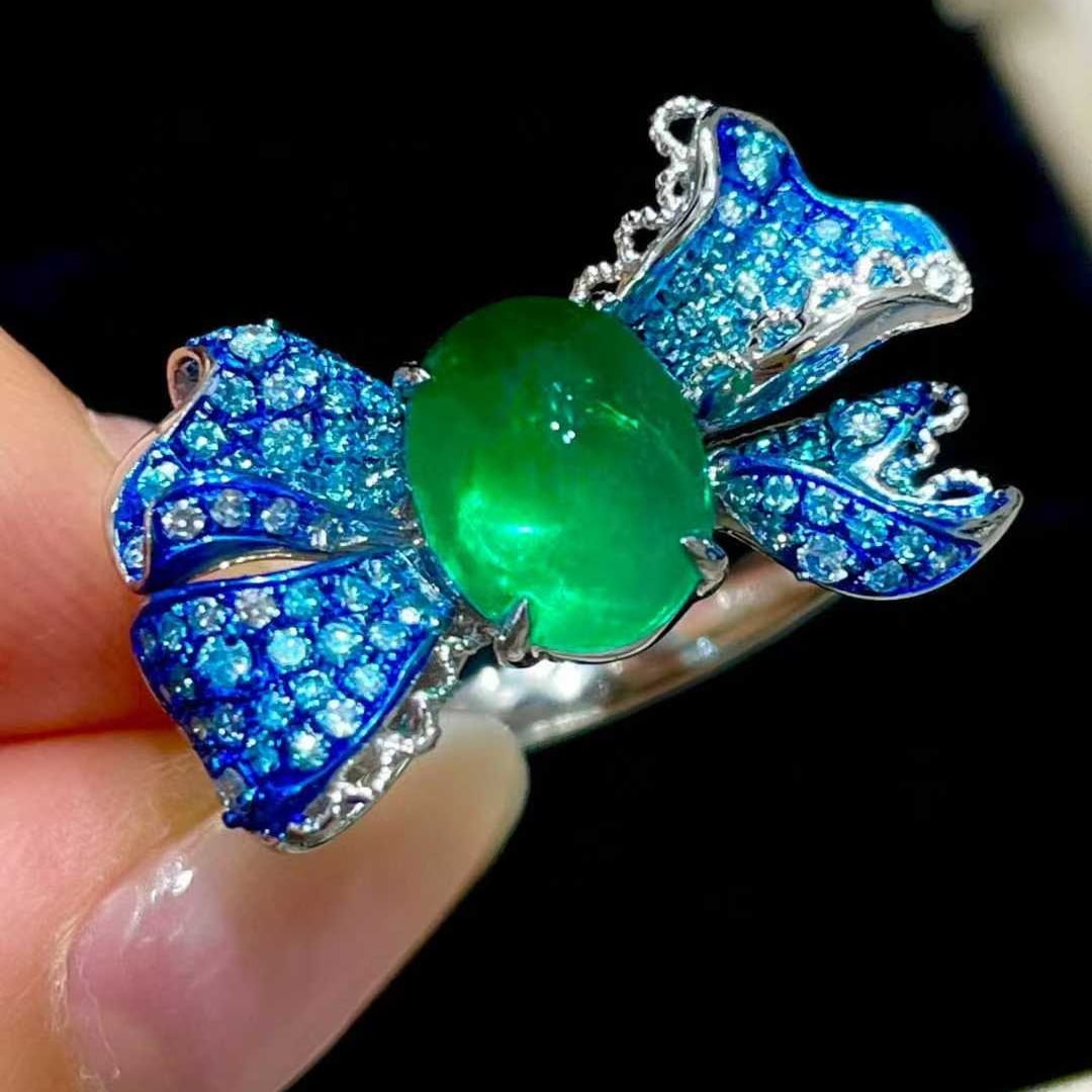 14k Gold 2 Ct Vivid Green Natural Emerald & Diamond Ring: Ref:231036230 // gold content:14k gold // ring size:7. 25us // // main gemstone:emerald // shape:oval // carat weight:2ct // color:vivid green // treatment:natural // // adjacent gemstone 2 : diamond 