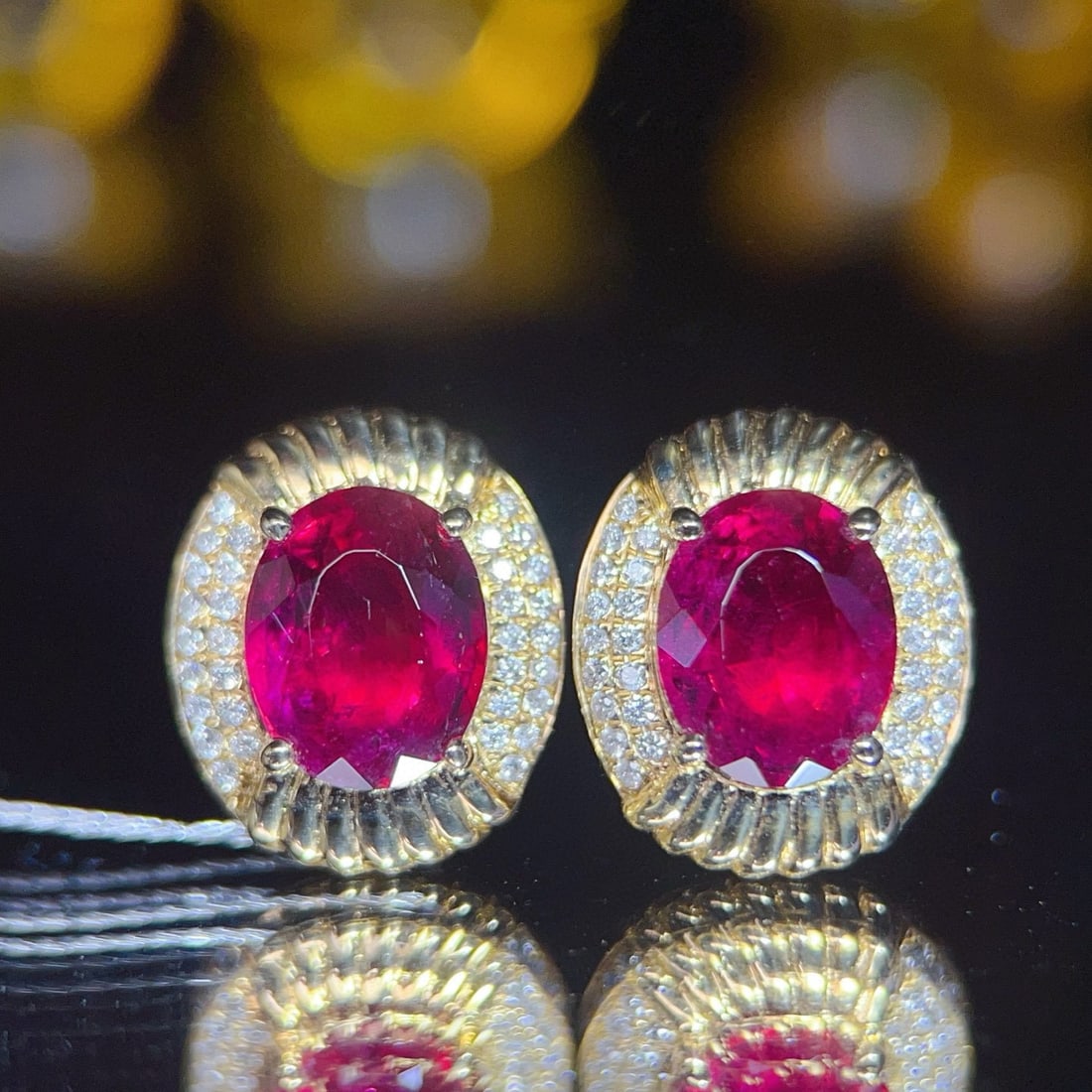 14k Gold 2.85 Ct Natural Tourmaline & Diamond Earrings: Ref:231036253 // gold content:14k gold // main gemstone:tourmaline // shape:oval // carat weight:2. 85ct // color:red // treatment:natural // // adjacent gemstone 2 : diamond // number of stones:64 //