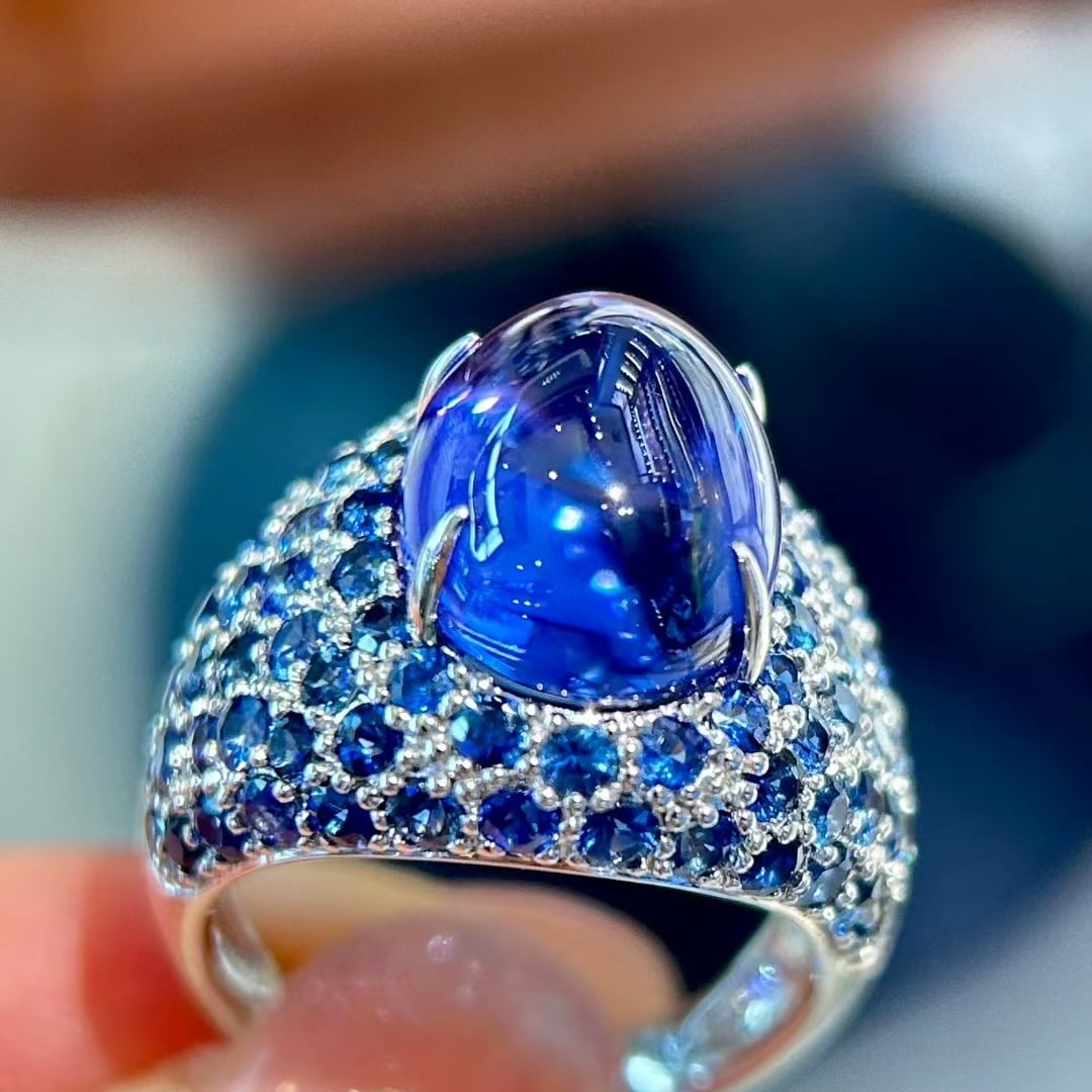 14k Gold 14.01 Ctw Natural Tanzanite & Sapphire Ring: Ref:231036259 // gold content:14k gold // ring size:7. 25us // // main gemstone:tanzanite // shape:oval // carat weight:9. 99ct // color:blue // treatment:natural // // adjacent gemstone 2 : sapphire