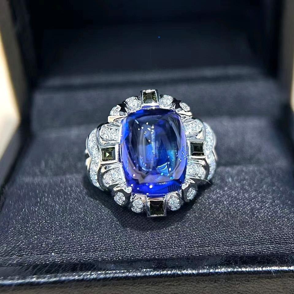 14k Gold 11.72 Ctw Natural Tanzanite & Diamond Ring: Ref:231036291 // gold content:14k gold // ring size:7. 25us // // main gemstone:tanzanite // shape:suger-loaf // carat weight:10. 71ct // color:blue // treatment:natural // // adjacent gemstone 2 :