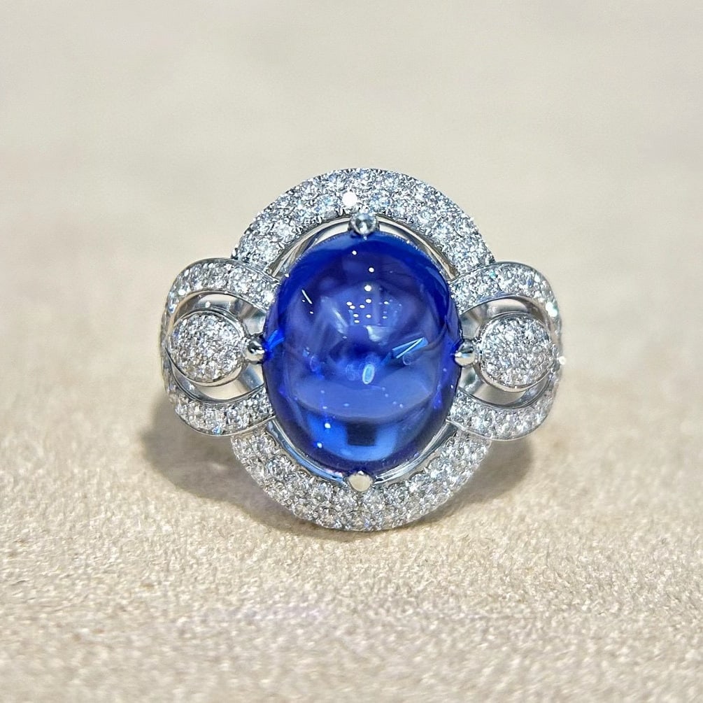 14k Gold 8.22 Ctw Natural Tanzanite & Diamond Ring: Ref:231036334 // gold content:14k gold // ring size:7. 25us // // main gemstone:tanzanite // shape:oval // carat weight:7. 43ct // color:blue // treatment:natural // // adjacent gemstone 2 : diamond