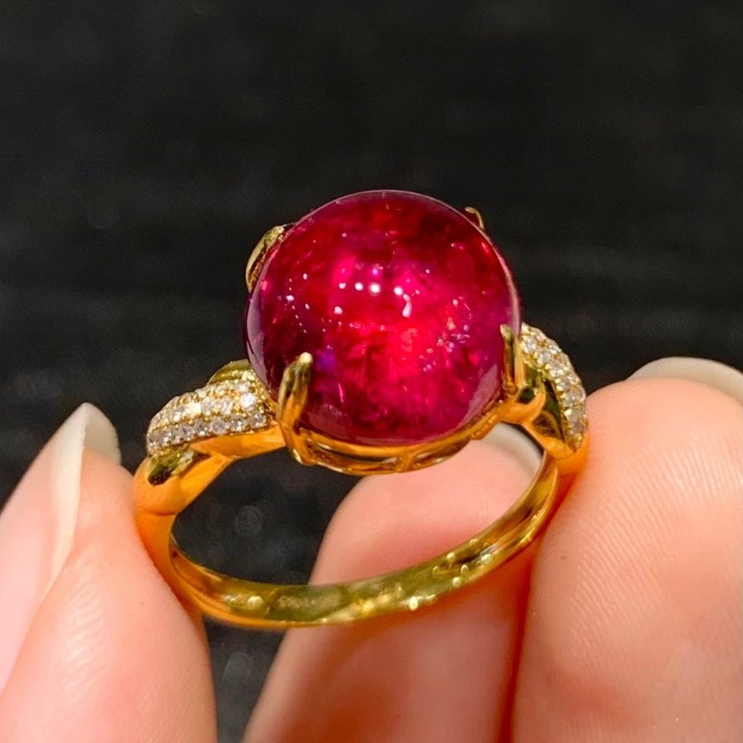 14k Gold 6.1 Ct Natural Tourmaline & Diamond Ring: Ref:231036337 // gold content:14k gold // ring size:7. 25us // // main gemstone:tourmaline // shape:round // carat weight:6. 1ct // color:red // treatment:natural // cut grade:g // // adjacent