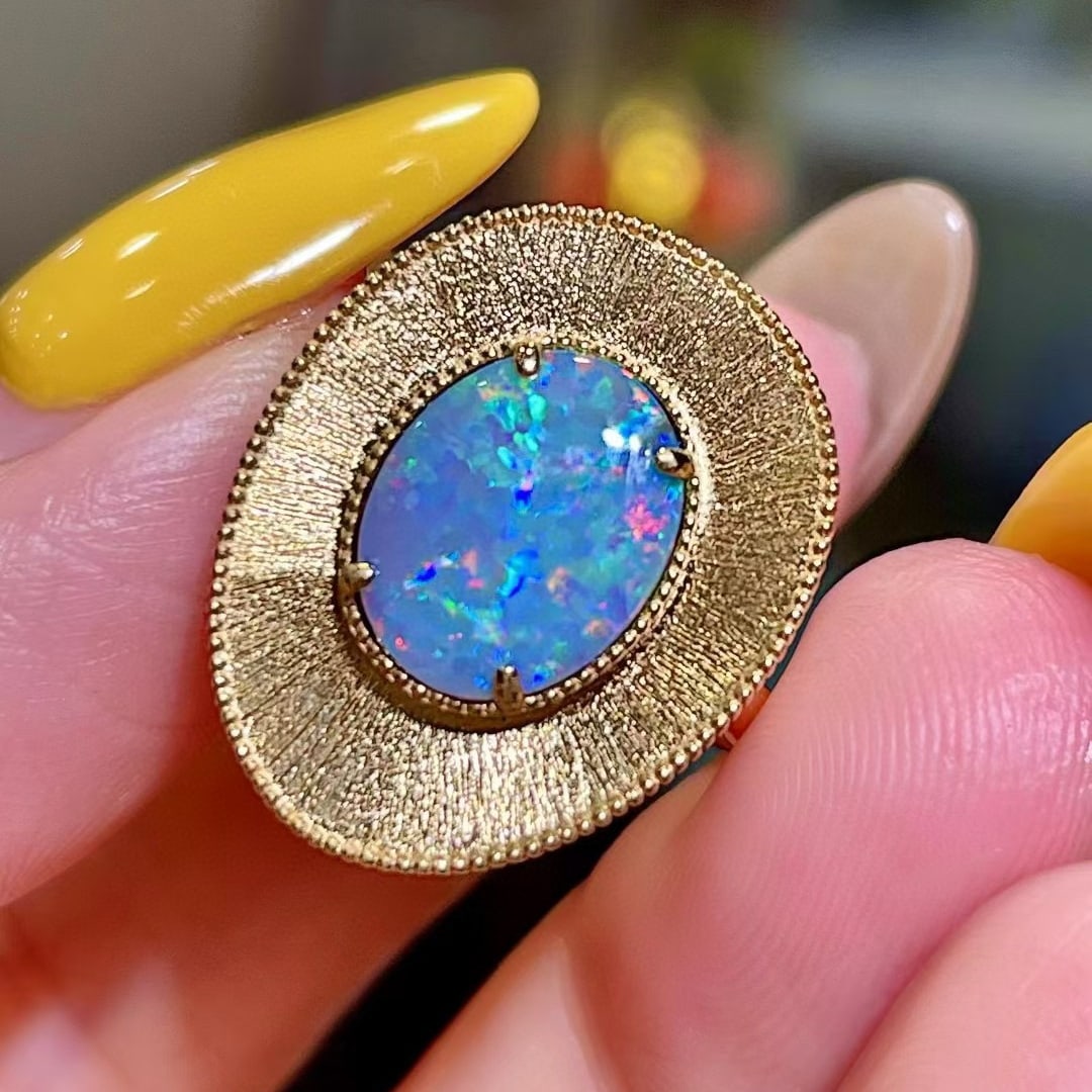14k Gold 1.55 Ct Natural Opal Ring: Ref:231036341 // gold content:14k gold // ring size:7. 25us // // main gemstone:opal // shape:oval // carat weight:1. 55ct // color:color // treatment:natural // Condition: New Low Estimate: 7700