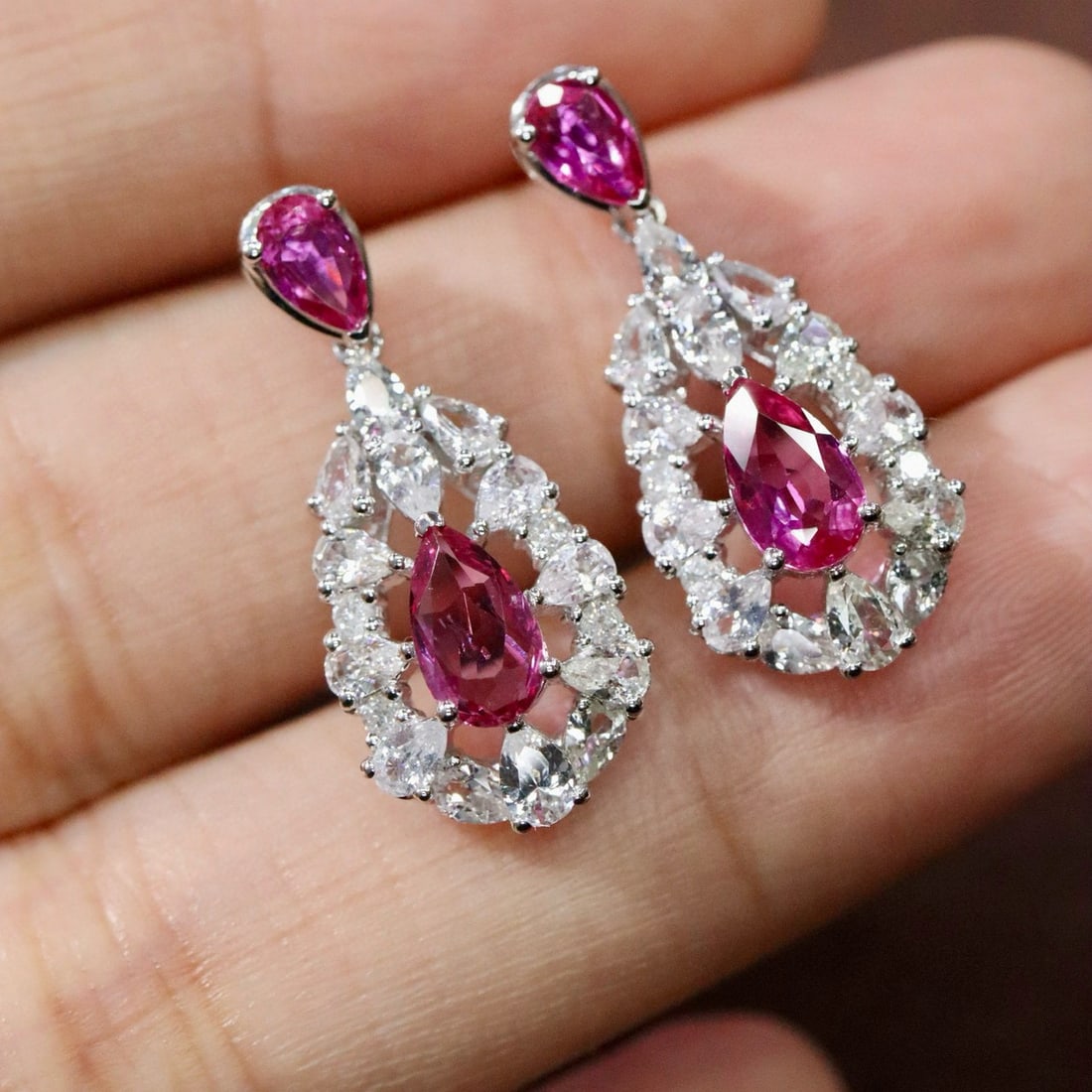 14k Gold 2.02 Ctw Natural Ruby & Diamond Earrings: Ref:231036361 // gold content:14k gold // main gemstone:ruby // shape:pear // carat weight:1. 90ct // color:red // treatment:natural // // adjacent gemstone 2 : diamond // shape:round // carat