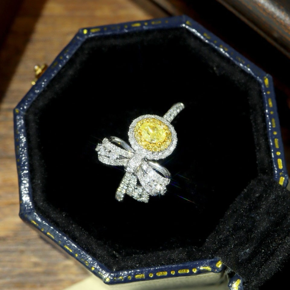 14k Gold 0.57 Ctw Natural Yellow Diamond & Diamond Ring: Ref:231036365 // gold content:14k gold // ring size:7. 25us // // main gemstone:yellow diamond // shape:oval // carat weight:0. 21ct // color:yellow // treatment:natural // // adjacent gemstone 2 :