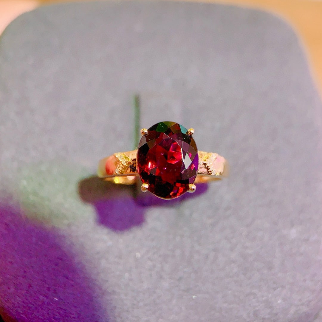 14k Gold 3.53 Ctw Natural Tourmaline & Diamond Ring: Ref:231036376 // gold content:14k gold // ring size:7. 25us // // main gemstone:tourmaline // shape:oval // carat weight:3. 5ct // color:red // treatment:natural // // adjacent gemstone 2 : diamond
