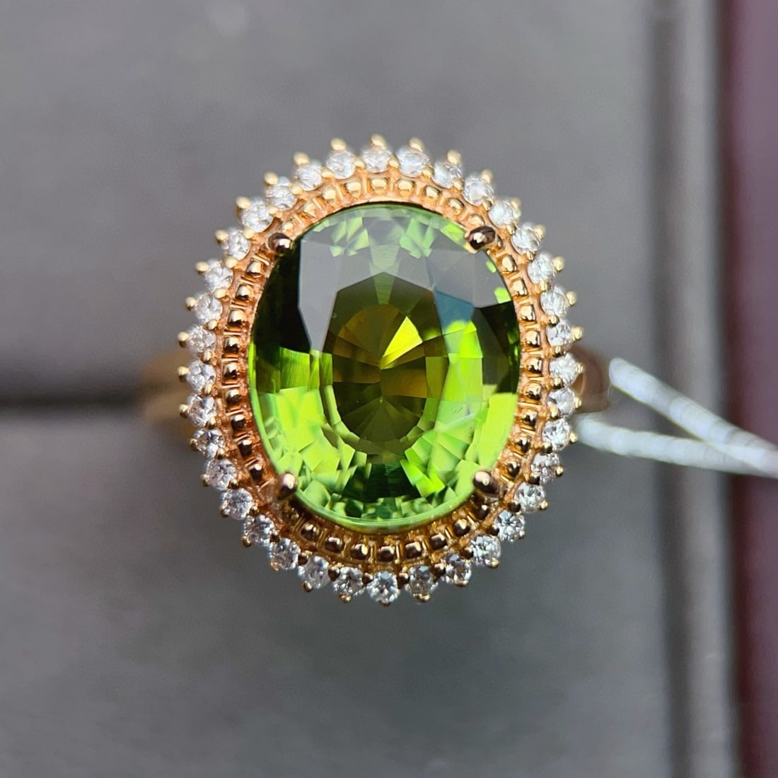 14k Gold 6.5 Ct Natural Tourmaline & Diamond Ring: Ref:231036433 // gold content:14k gold // ring size:7. 25us // // main gemstone:tourmaline // shape:oval // carat weight:6. 5ct // color:green // treatment:natural // // adjacent gemstone 2 : diamond