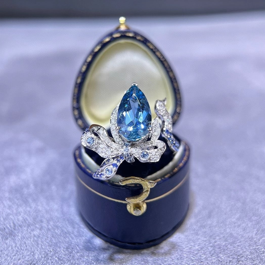 14k Gold 3.23 Ctw Natural Aquamarine & Diamond Ring: Ref:231036436 // gold content:14k gold // ring size:7. 25us // // main gemstone:aquamarine // shape:pear // carat weight:2. 6ct // color:santa maria color // treatment:natural // // adjacent gemstone