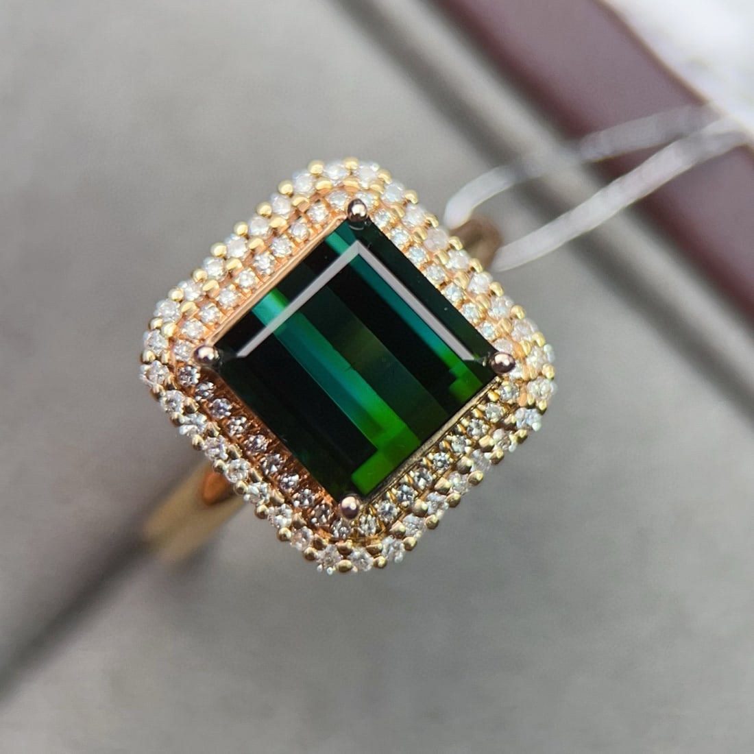 14k Gold 3.54 Ctw Natural Tourmaline & Diamond Ring: Ref:231036438 // gold content:14k gold // ring size:7. 25us // // main gemstone:tourmaline // shape:octagonal // carat weight:3. 25ct // color:green // treatment:natural // // adjacent gemstone 2 :