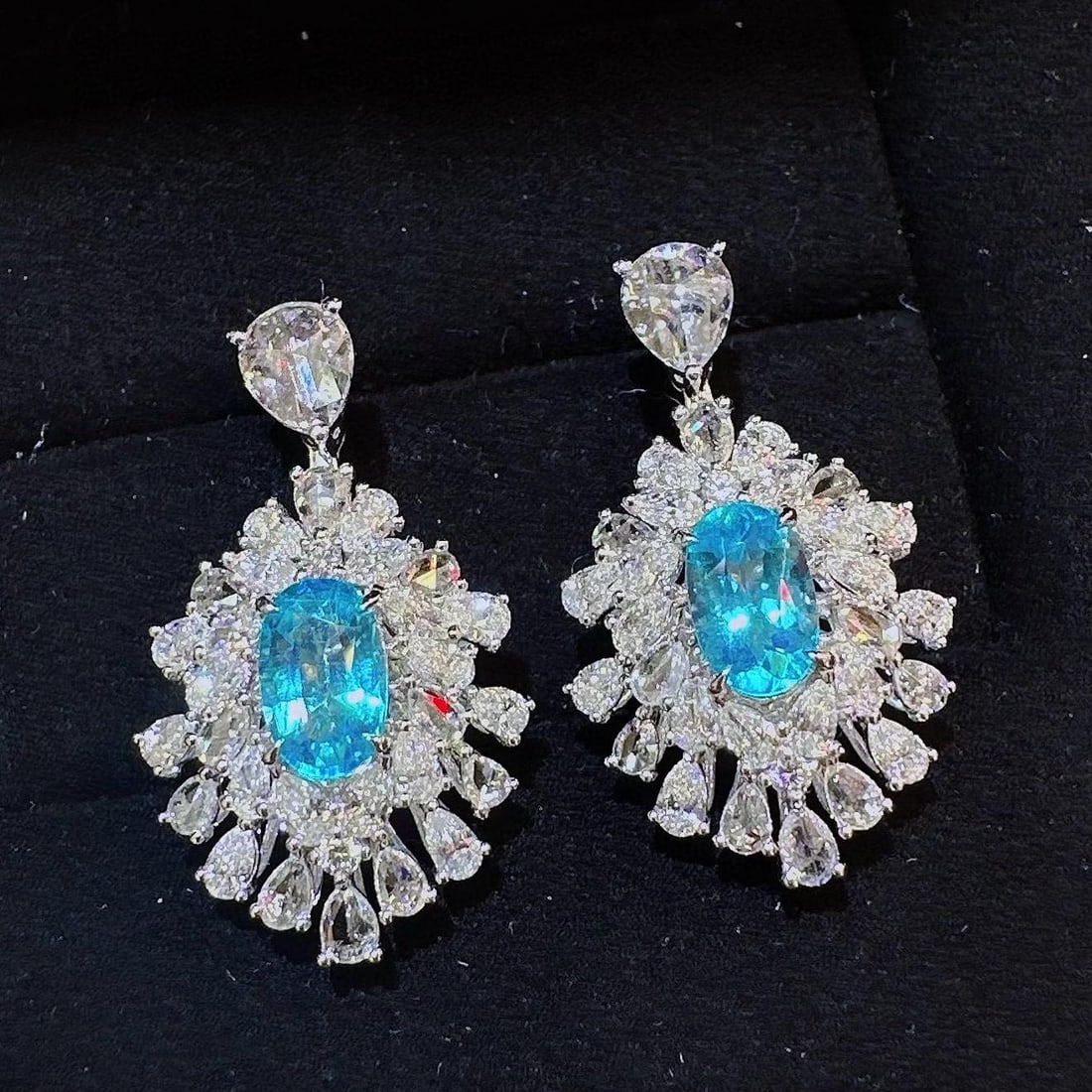 14k Gold 3.12 Ctw Natural Paraiba Tourmaline & Diamond Earrings: Ref:231037054 // gold content:14k gold // main gemstone:paraiba tourmaline // shape:oval // carat weight:1. 14ct // color:blue // treatment:natural // // adjacent gemstone 2 : diamond // shape:multipl