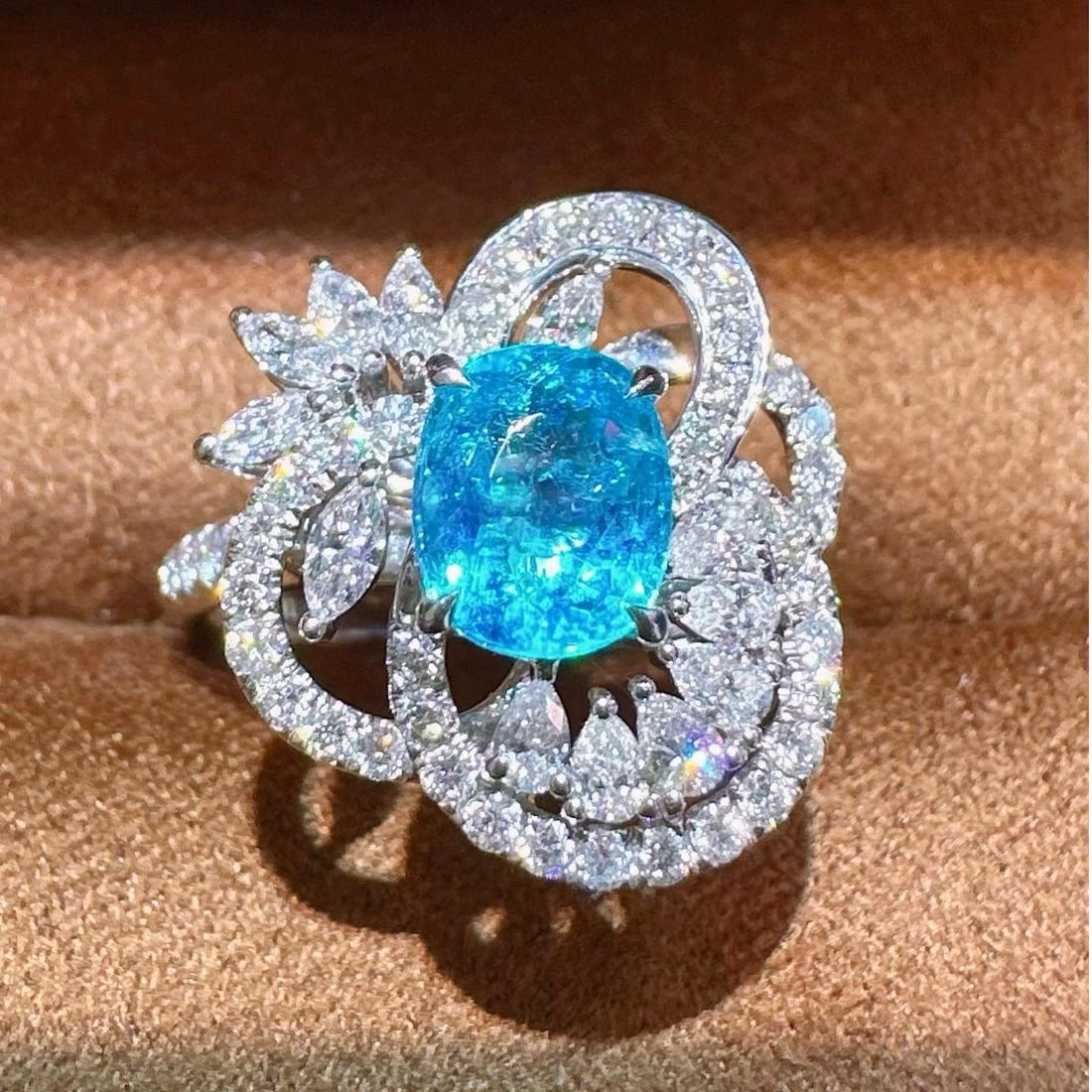 14k Gold 2.12 Ctw Natural Paraiba Tourmaline & Diamond Ring: Ref:231037055 // gold content:14k gold // ring size:7. 25us // // main gemstone:paraiba tourmaline // shape:oval // carat weight:1. 23ct // color:blue // treatment:natural // // adjacent gemstone 2 :