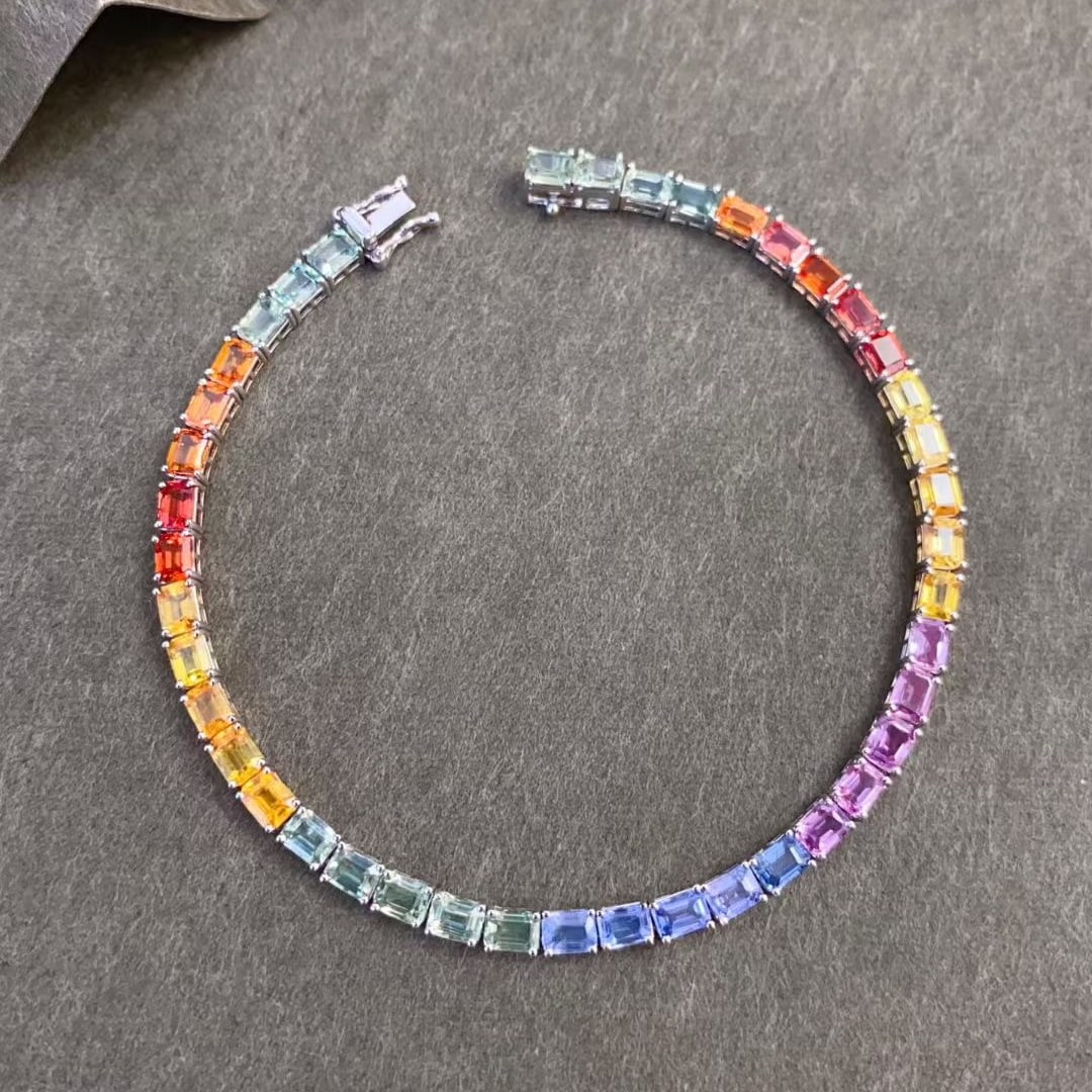 14k Gold 9.5 Ct Natural Sapphire Bracelet: Ref:231037105 // gold content:14k gold // main gemstone:sapphire // shape:octagonal // carat weight:9. 5ct // color:color // treatment:natural // Condition: New Low Estimate: 7000.00 High Estimate: