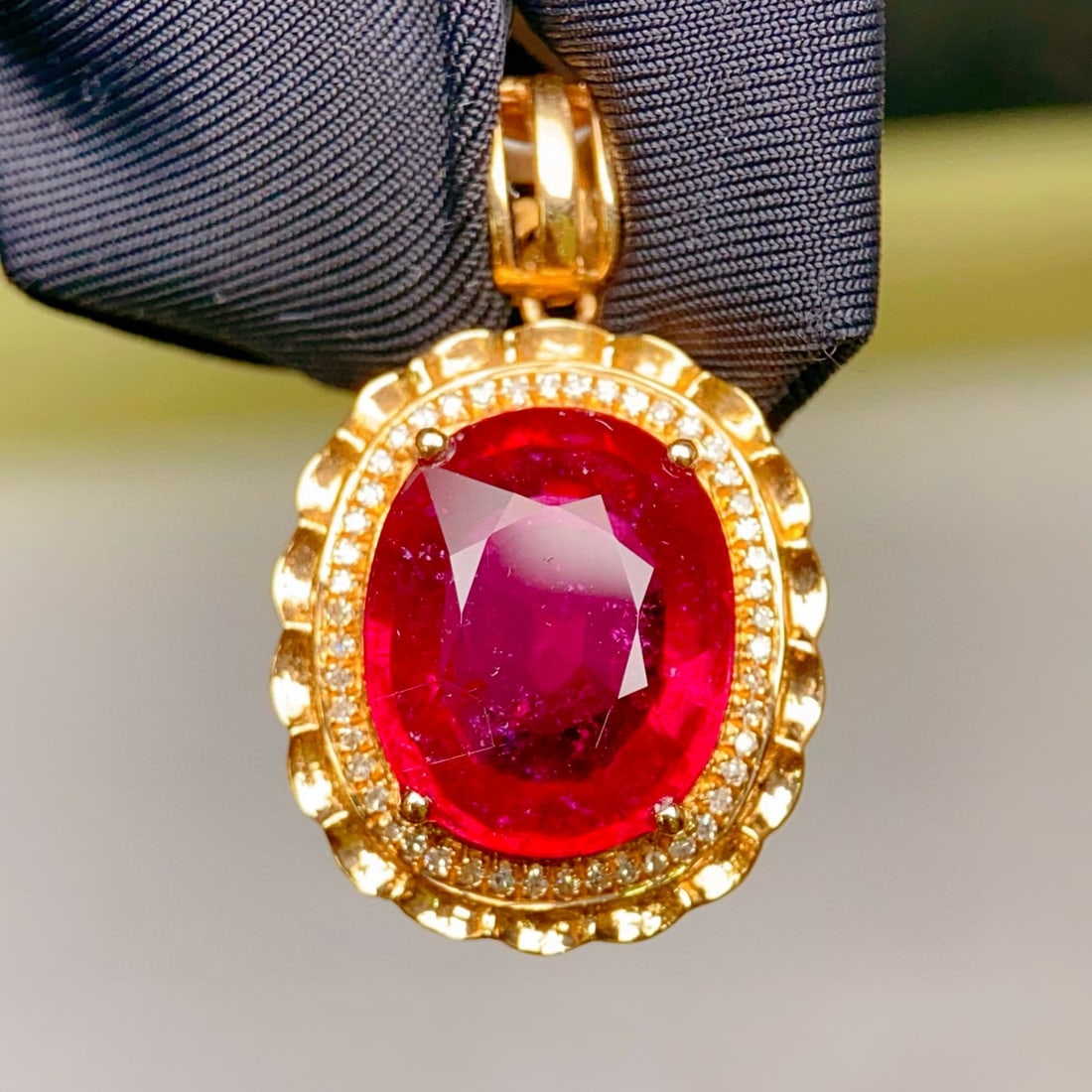 14k Gold 5.29 Ctw Natural Tourmaline & Diamond Pendant( Without Chain ): Ref:231037151 // gold content:14k gold // main gemstone:tourmaline // shape:oval // carat weight:5. 15ct // color:red // treatment:natural // // adjacent gemstone 2 : diamond // number of stones:47