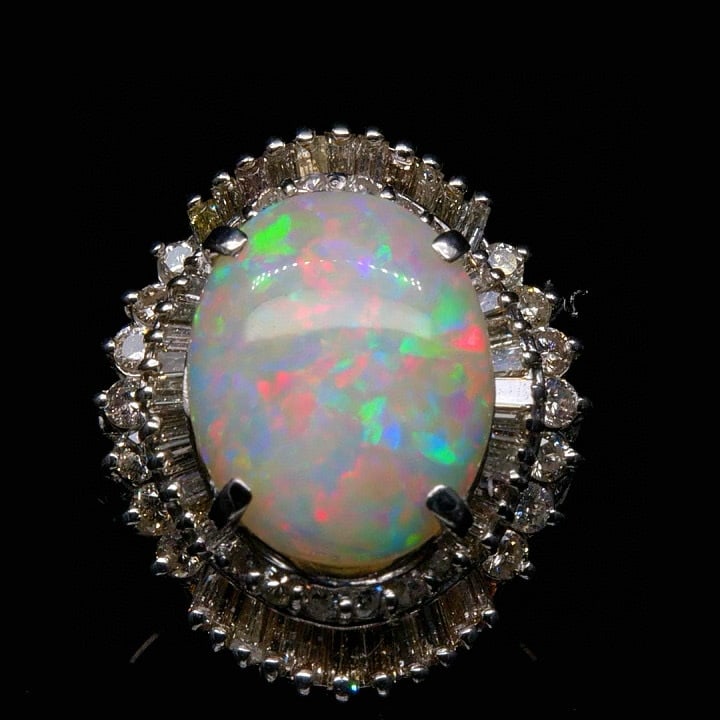 14k Gold 3.77 Ctw Natural Opal & Diamond Ring: Ref:231037172 // gold content:14k gold // ring size:7. 25us // // main gemstone:opal // shape:oval // carat weight:2. 51ct // color:color // treatment:natural // // adjacent gemstone 2 : diamond //