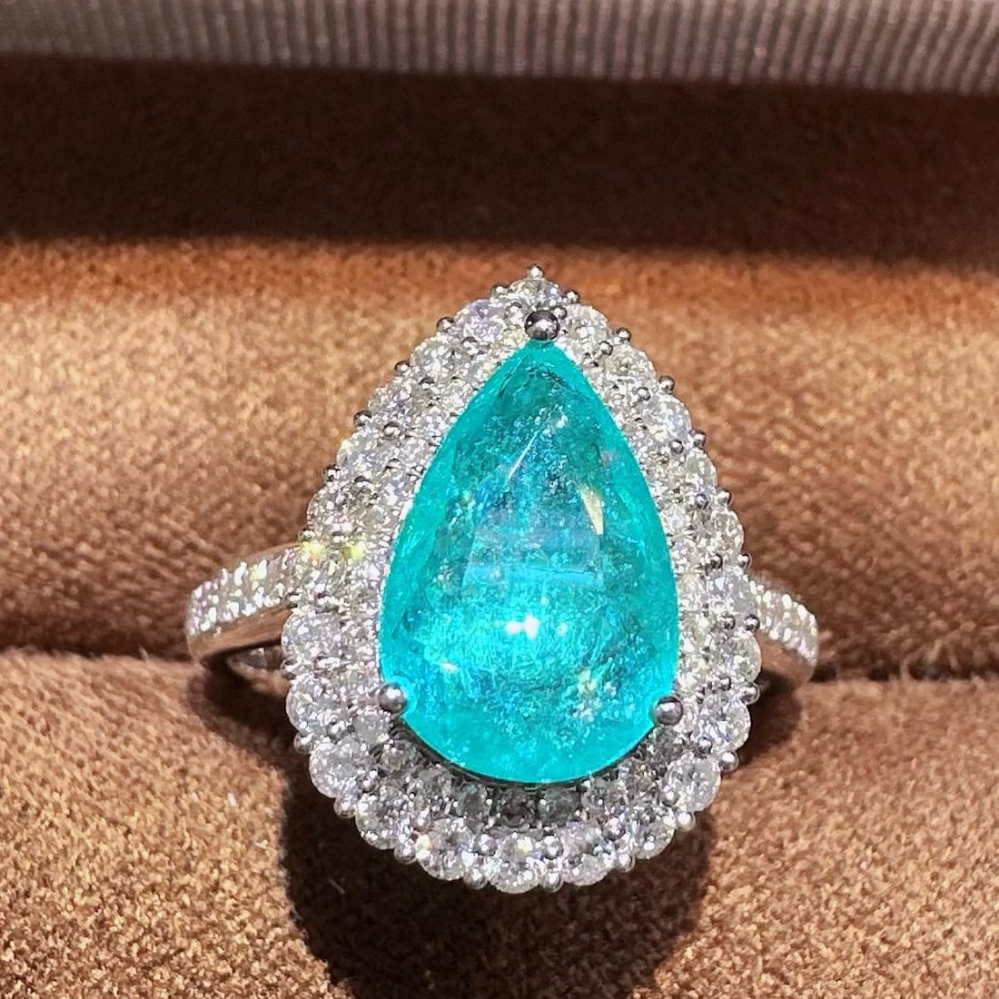 14k Gold 2.61 Ctw Natural Paraiba Tourmaline & Diamond Ring: Ref:231037197 // gold content:14k gold // ring size:7. 25us // // main gemstone:paraiba tourmaline // shape:pear // carat weight:2ct // color:blue // treatment:natural // // adjacent gemstone 2 : diam