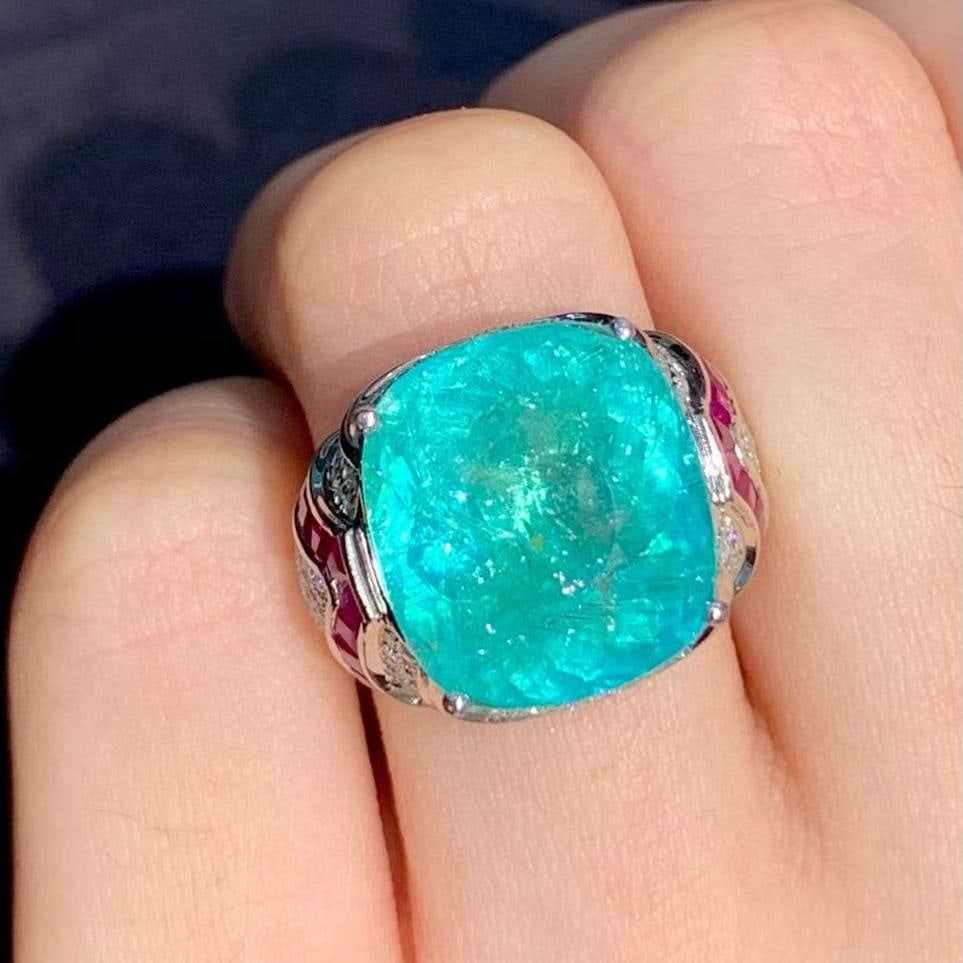 14k Gold 11.45 Ct Natural Paraiba Tourmaline & Diamond Ring: Ref:231037200 // gold content:14k gold // ring size:7. 25us // // main gemstone:paraiba tourmaline // shape:cushion // carat weight:11. 45ct // color:blue // treatment:natural // // adjacent gemstone