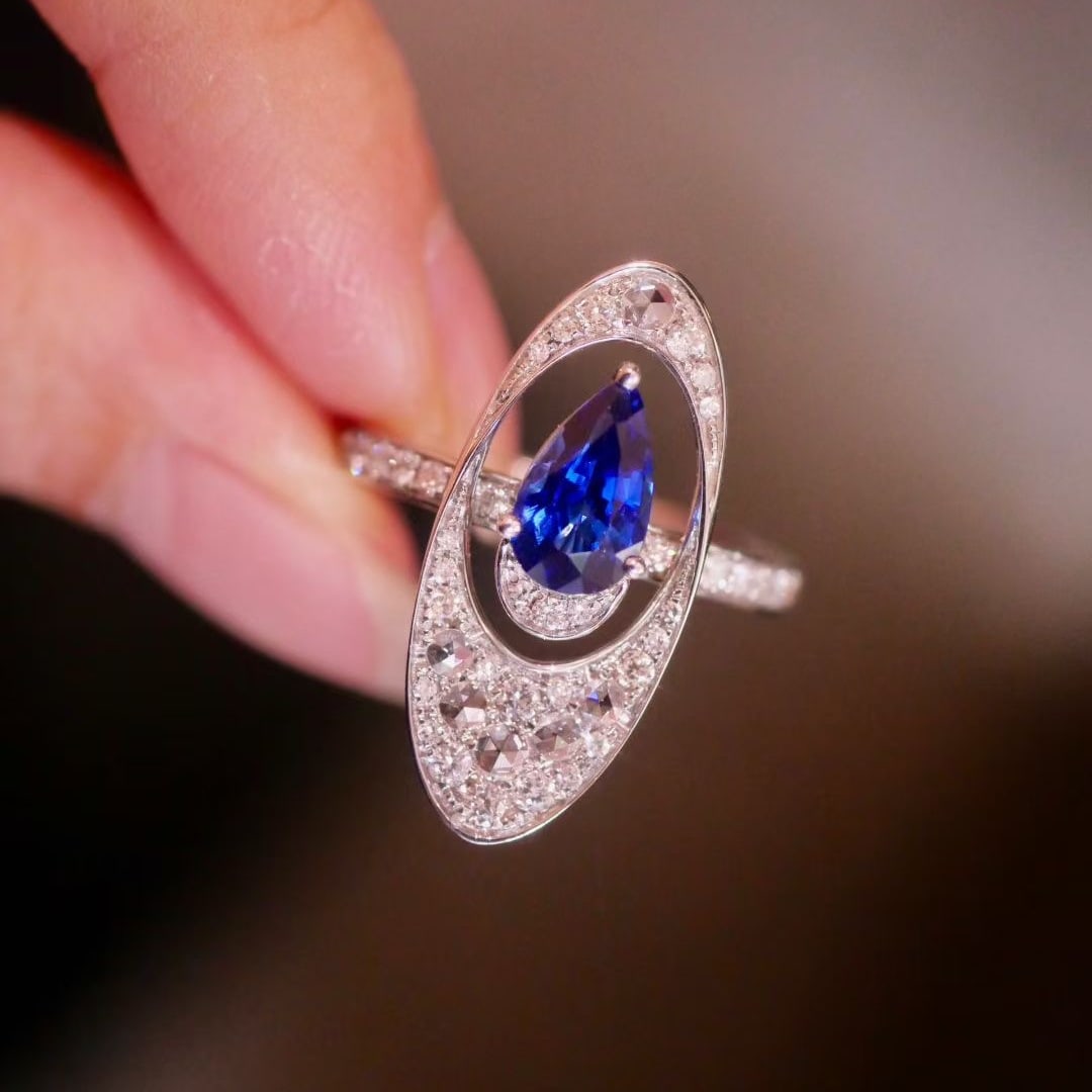 14k Gold 1.85 Ctw Natural Sapphire & Diamond Ring: Ref:231037229 // gold content:14k gold // ring size:7. 25us // // main gemstone:sapphire // shape:pear // carat weight:1. 28ct // color:royal blue // treatment:natural // // adjacent gemstone 2 :
