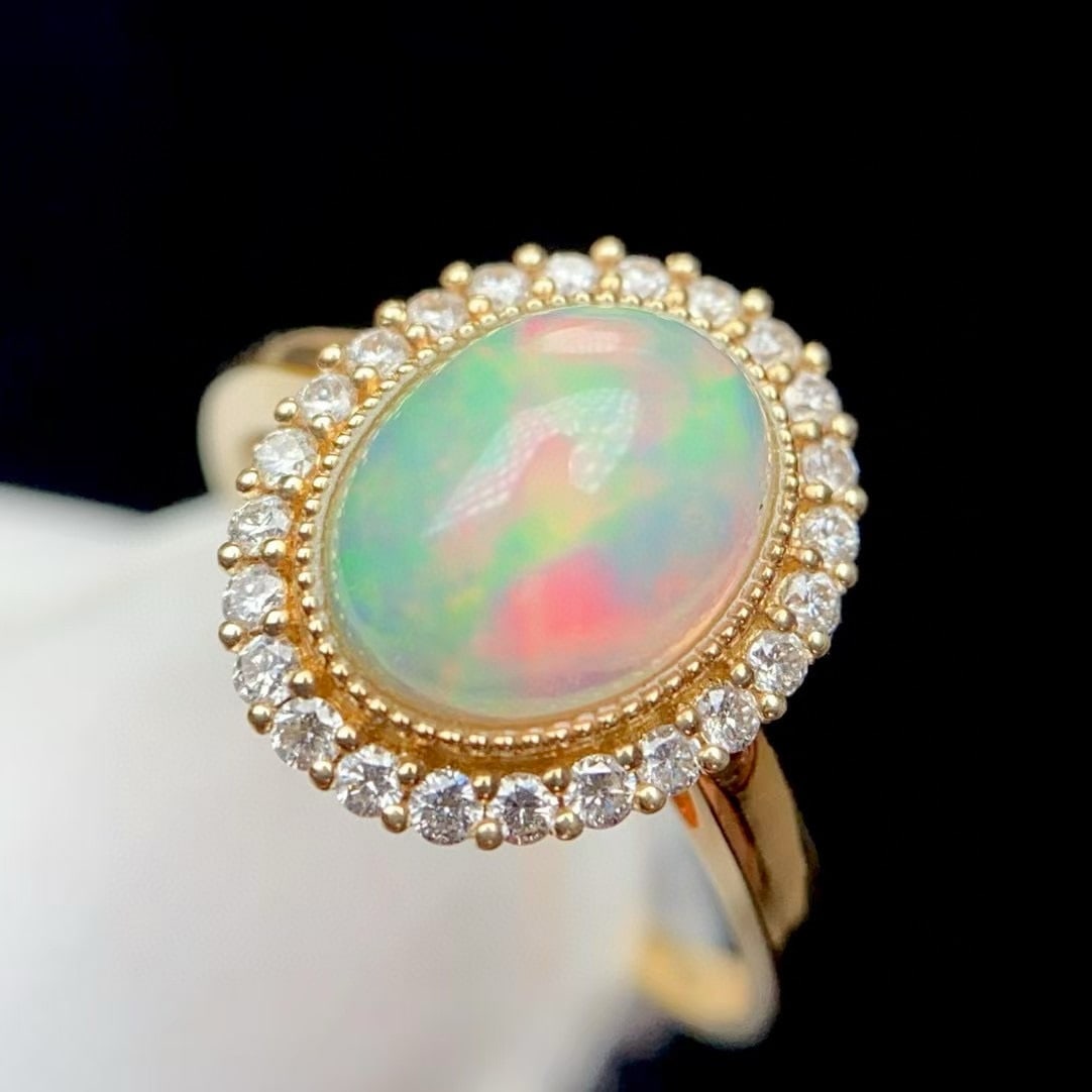 14k Gold 2 Ct Natural Opal & Diamond Ring: Ref:231037231 // gold content:14k gold // ring size:7. 25us // // main gemstone:opal // shape:oval // carat weight:2ct // color:color // treatment:natural // // adjacent gemstone 2 : diamond //