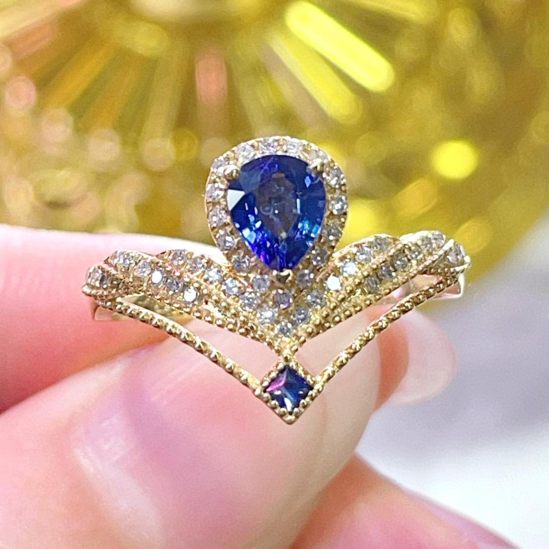 14k Gold 0.83 Ctw Natural Sapphire & Diamond Ring: Ref:231037259 // gold content:14k gold // ring size:7. 25us // // main gemstone:sapphire // shape:pear // carat weight:0. 62ct // color:blue // treatment:natural // // adjacent gemstone 2 : diamond //