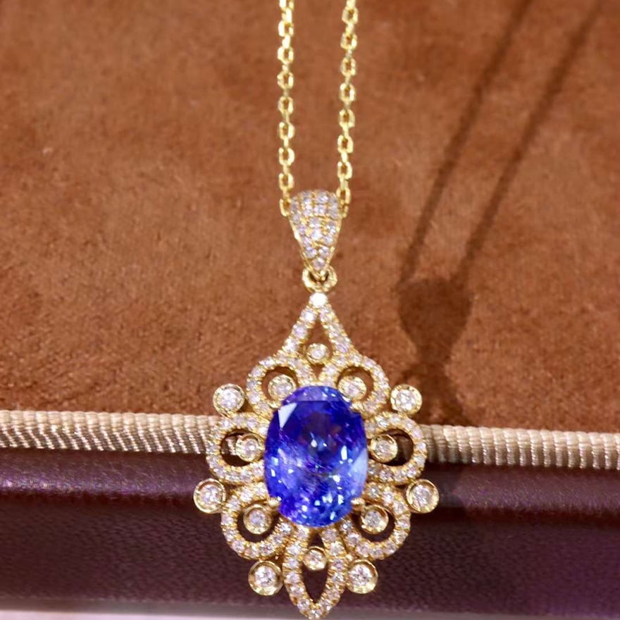 14k Gold 2.98 Ctw Natural Sapphire & Diamond Pendant( Without Chain ): Ref:231038004 // gold content:14k gold // main gemstone:sapphire // shape:oval // carat weight:2. 65ct // color:blue // treatment:natural // // adjacent gemstone 2 : diamond // shape:round // carat