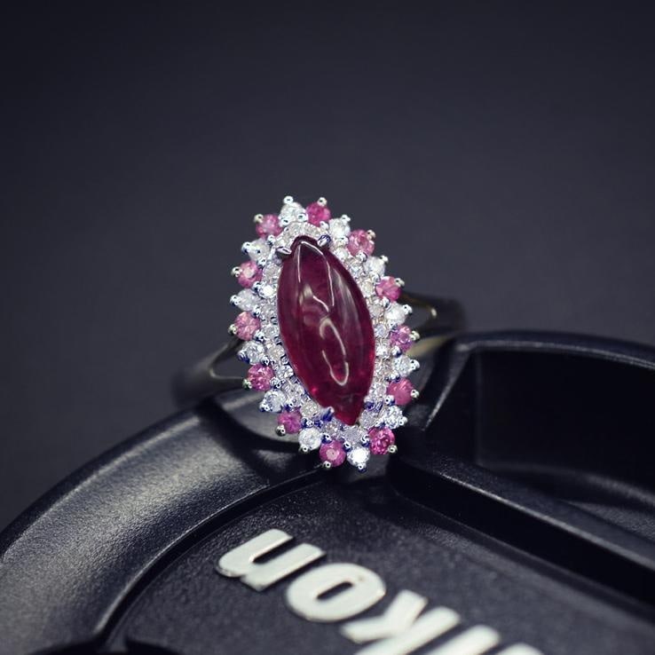 14k Gold 2.12 Ctw Natural Ruby & Diamond Ring: Ref:231038007 // gold content:14k gold // ring size:7. 25us // // main gemstone:ruby // shape:marquise // carat weight:1. 81ct // color:red // treatment:natural // // adjacent gemstone 2 : diamond //
