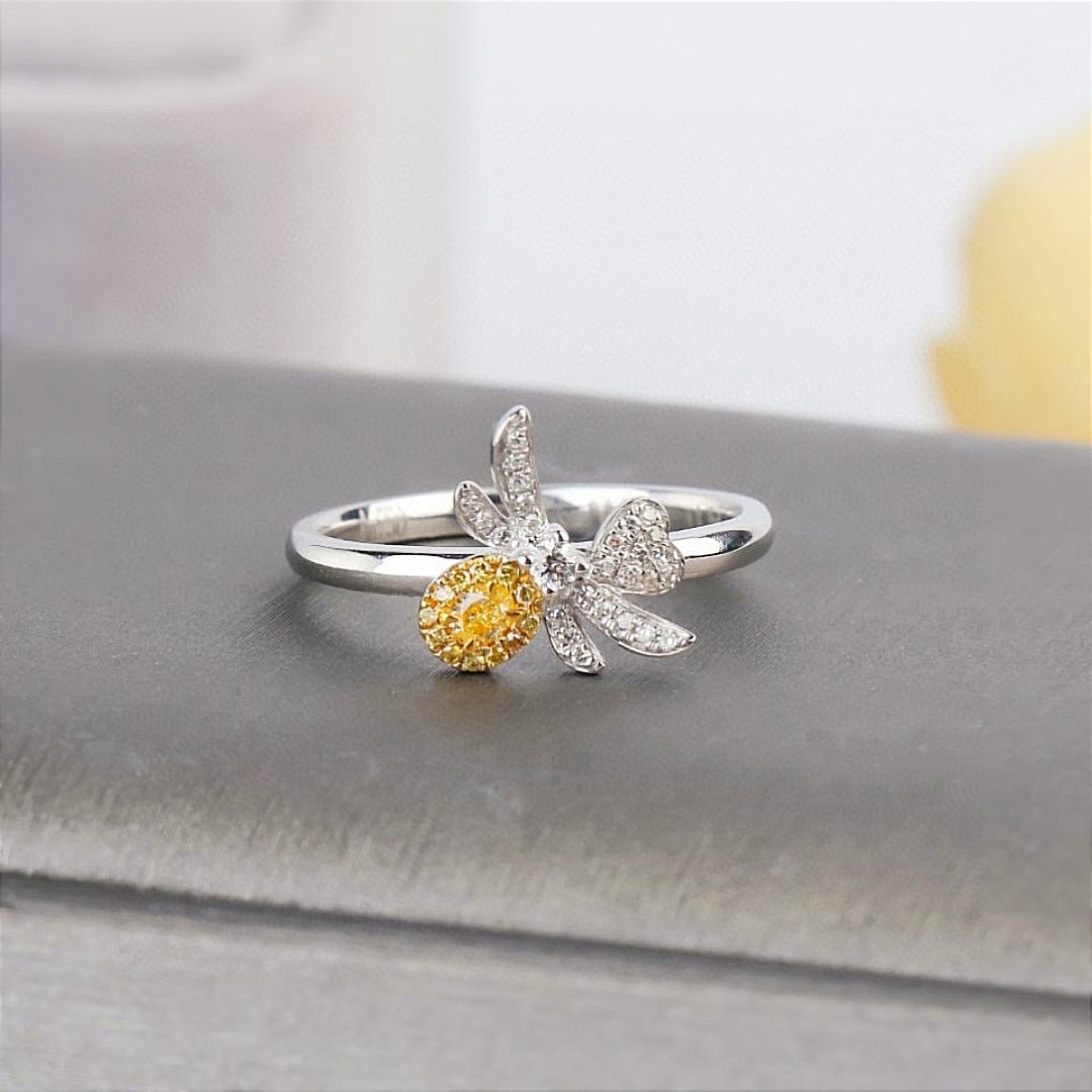 14k Gold 0.26 Ctw Natural Yellow Diamond & Diamond Ring: Ref:231038059 // gold content:14k gold // ring size:7. 25us // // main gemstone:yellow diamond // shape:oval // carat weight:0. 08ct // color:yellow // treatment:natural // // adjacent gemstone 2 : di