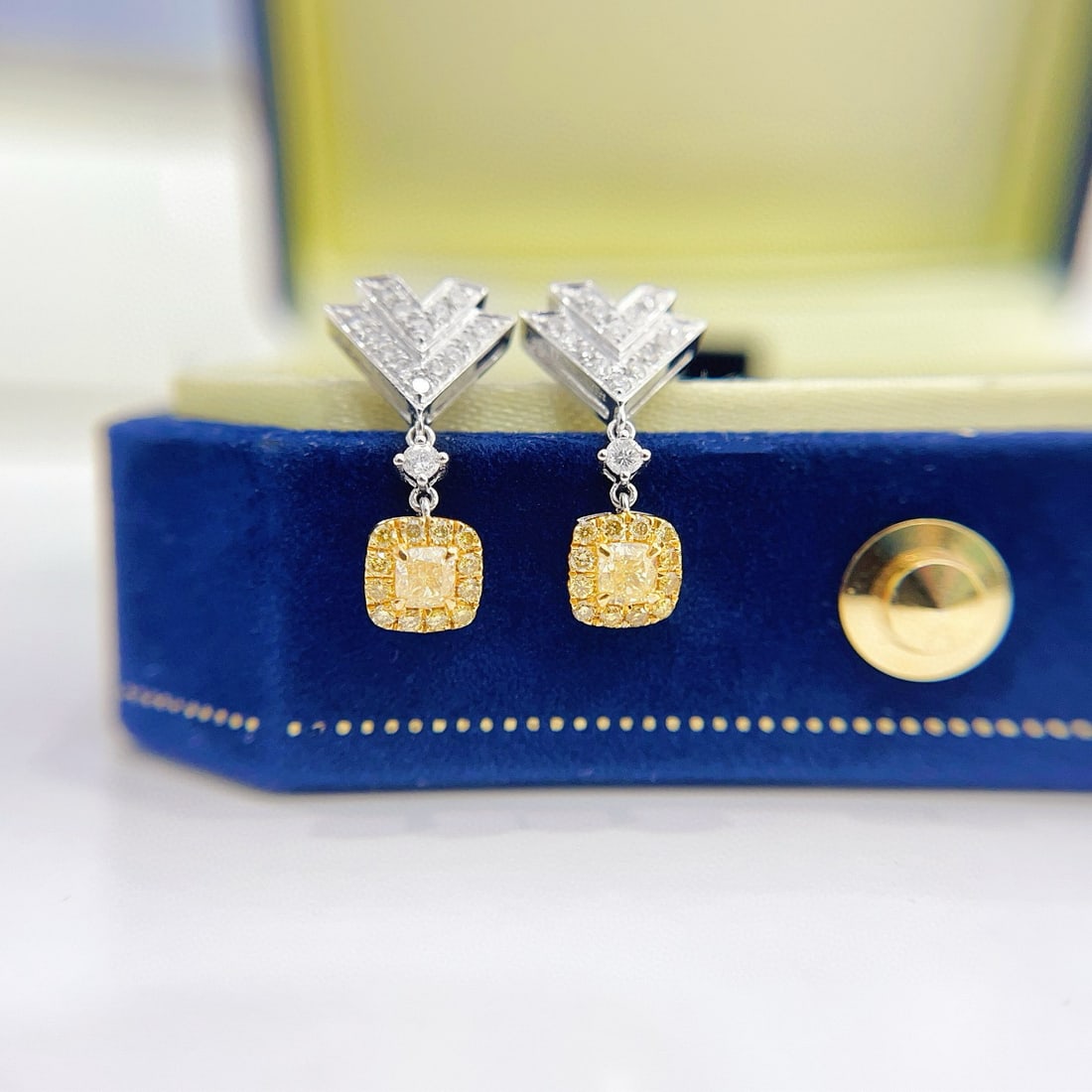 14k Gold 0.49 Ctw Natural Yellow Diamond & Diamond Earrings: Ref:231038060 // gold content:14k gold // main gemstone:yellow diamond // shape:cushion // carat weight:0. 2ct // color:yellow // treatment:natural // // adjacent gemstone 2 : diamond // shape:round