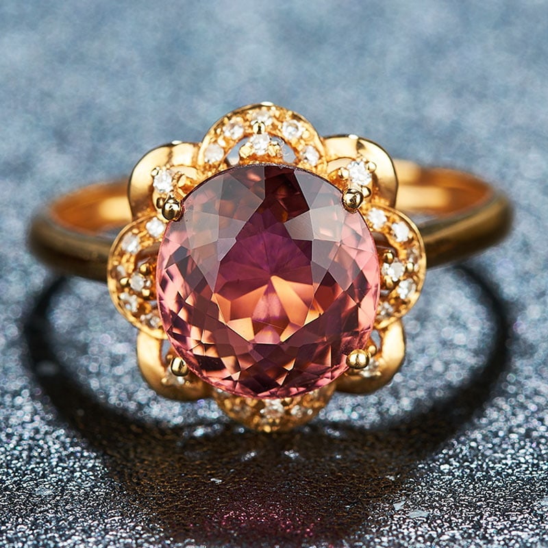 14k Gold 2.41 Ct Natural Tourmaline & Diamond Ring: Ref:231038068 // gold content:14k gold // ring size:7. 25us // // main gemstone:tourmaline // shape:oval // carat weight:2. 41ct // color:red // treatment:natural // // adjacent gemstone 2 : diamond