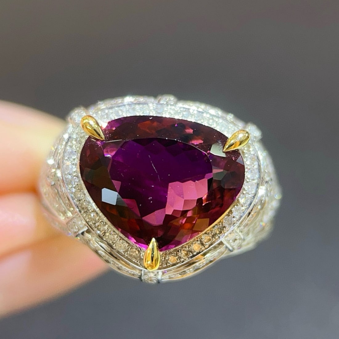14k Gold 6.13 Ctw Natural Tourmaline & Diamond Ring: Ref:231038118 // gold content:14k gold // ring size:7. 25us // // main gemstone:tourmaline // shape:pear // carat weight:5. 5ct // color:red // treatment:natural // // adjacent gemstone 2 : diamond