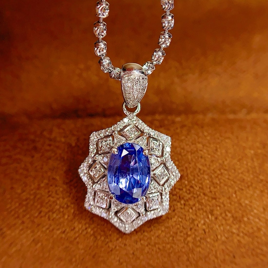 14k Gold 1.2 Ct Natural Sapphire & Diamond Pendant( Without Chain ): Ref:231038138 // gold content:14k gold // main gemstone:sapphire // shape:oval // carat weight:1. 2ct // color:blue // treatment:natural // // adjacent gemstone 2 : diamond // number of stones:76 //